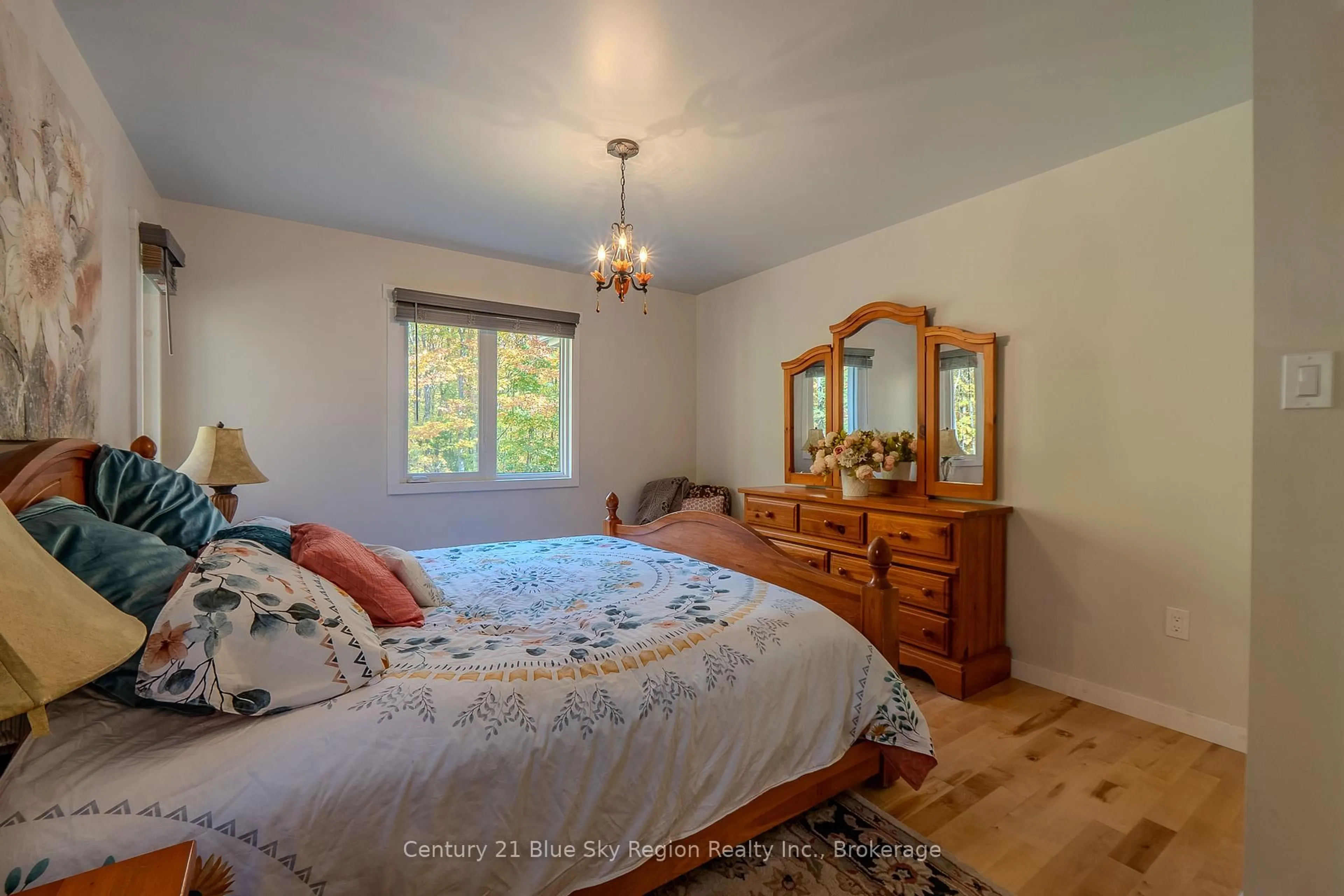 Bedroom with bed, wood/laminate floor for 503 Ski Hill Rd, Powassan Ontario P0H 1Z0