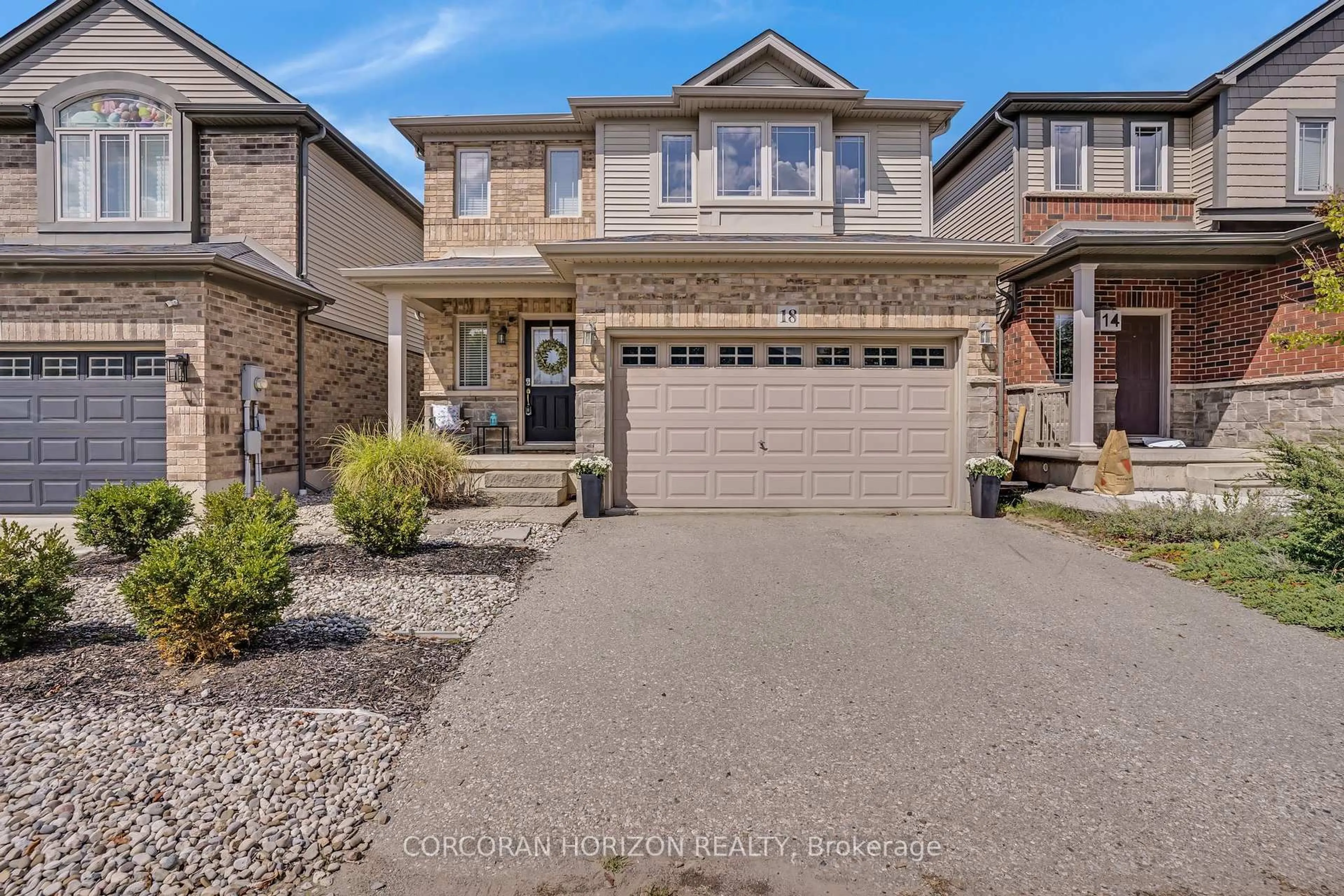 Home with brick exterior material, street for 18 Creek Ridge St, Kitchener Ontario N2R 0B5