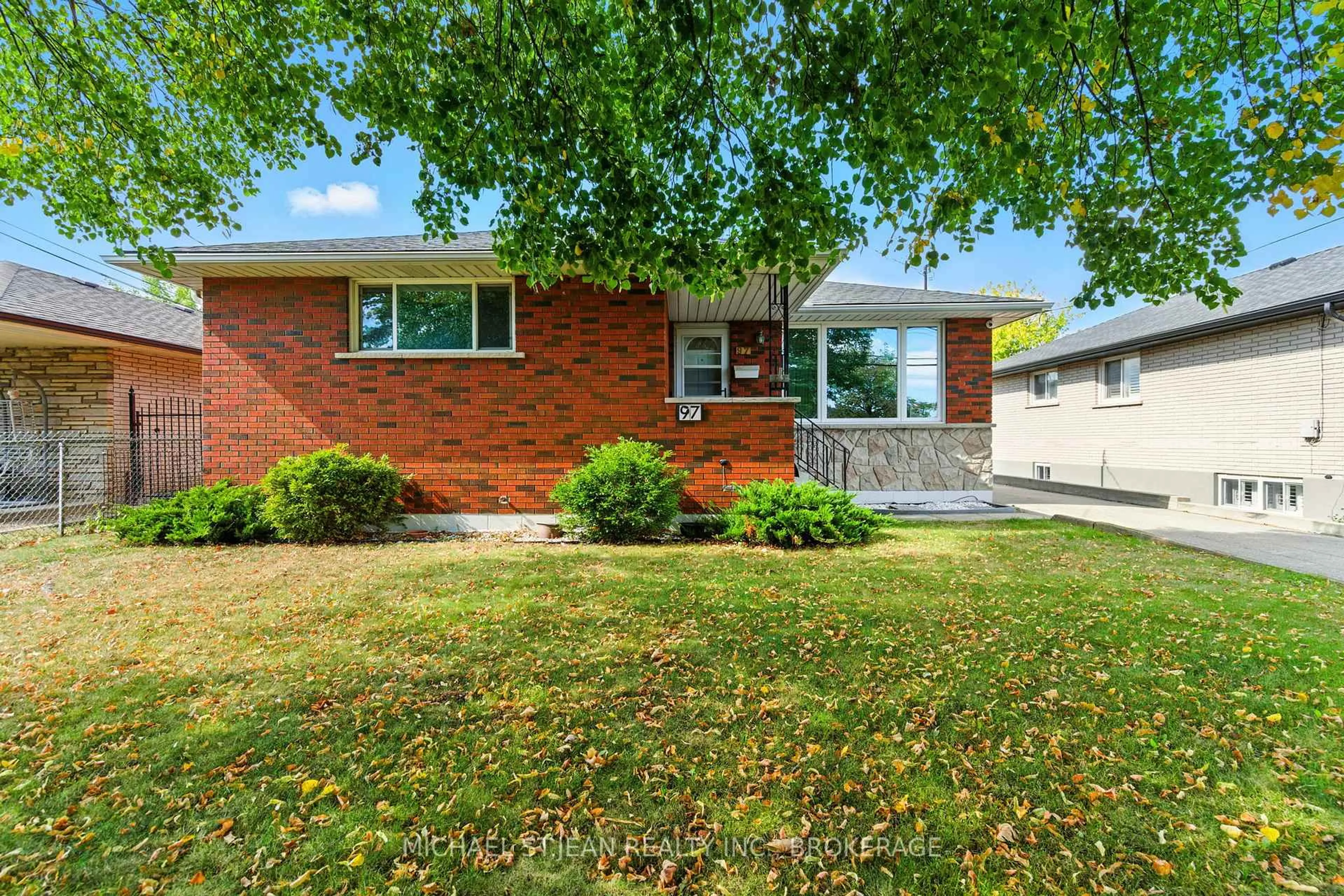 Home with brick exterior material, street for 97 Kenora Ave, Hamilton Ontario L8E 1C3
