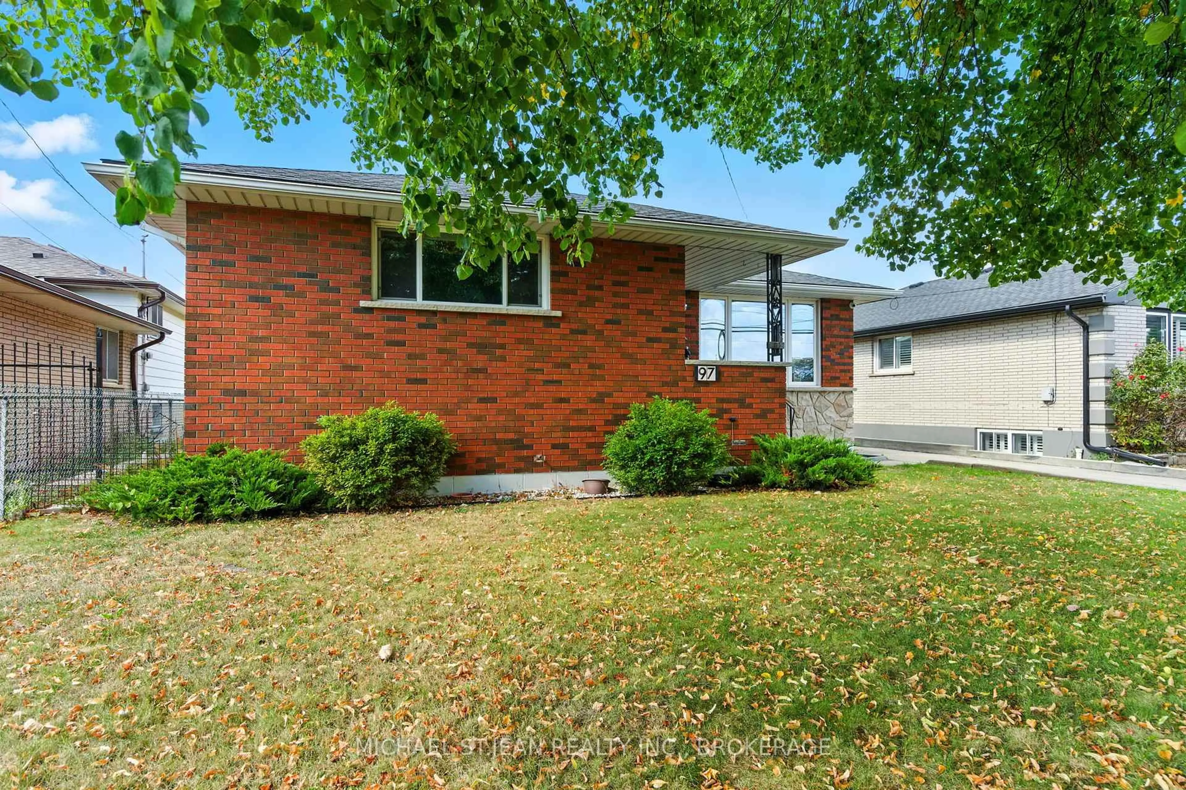Home with brick exterior material, street for 97 Kenora Ave, Hamilton Ontario L8E 1C3