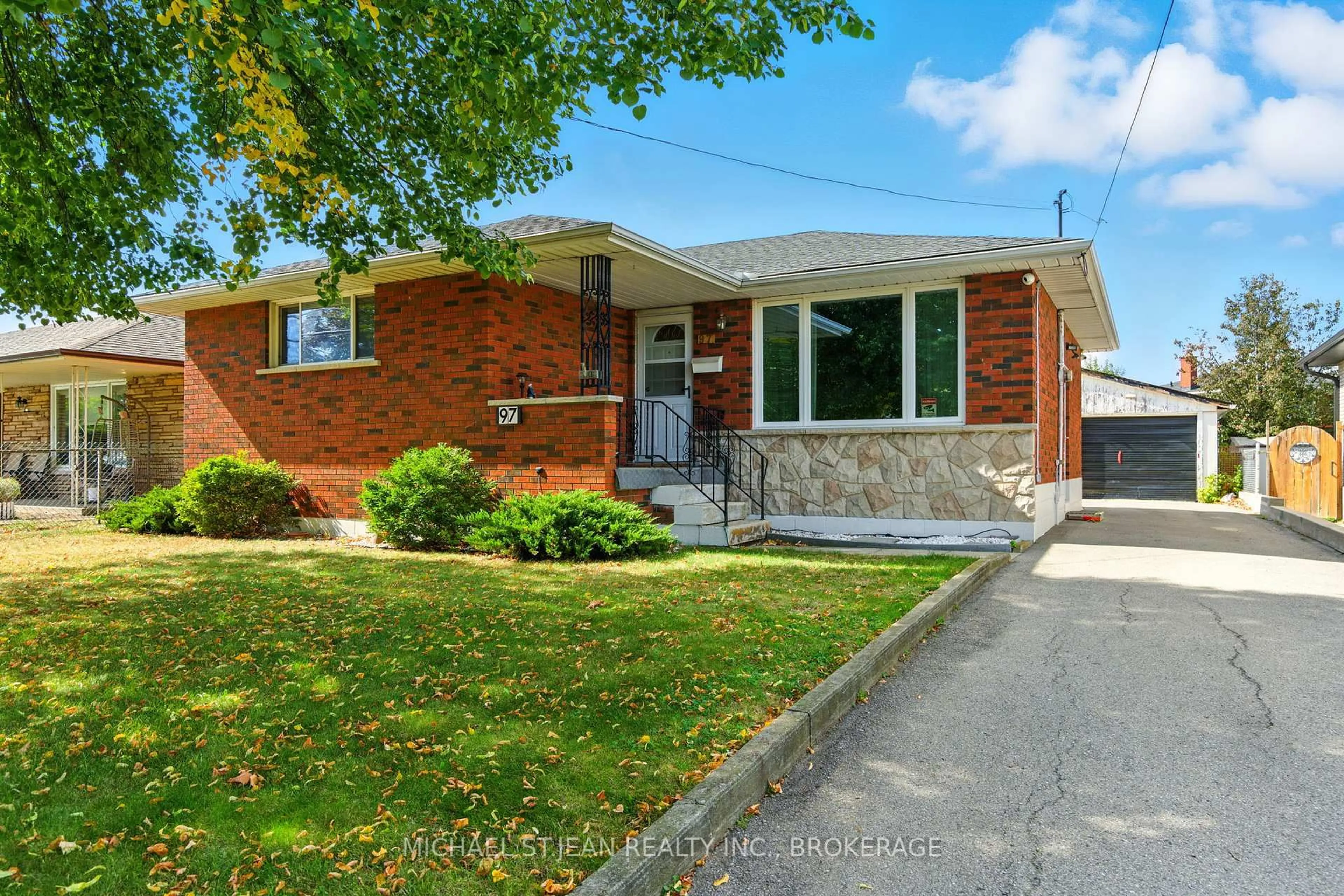 Home with brick exterior material, street for 97 Kenora Ave, Hamilton Ontario L8E 1C3