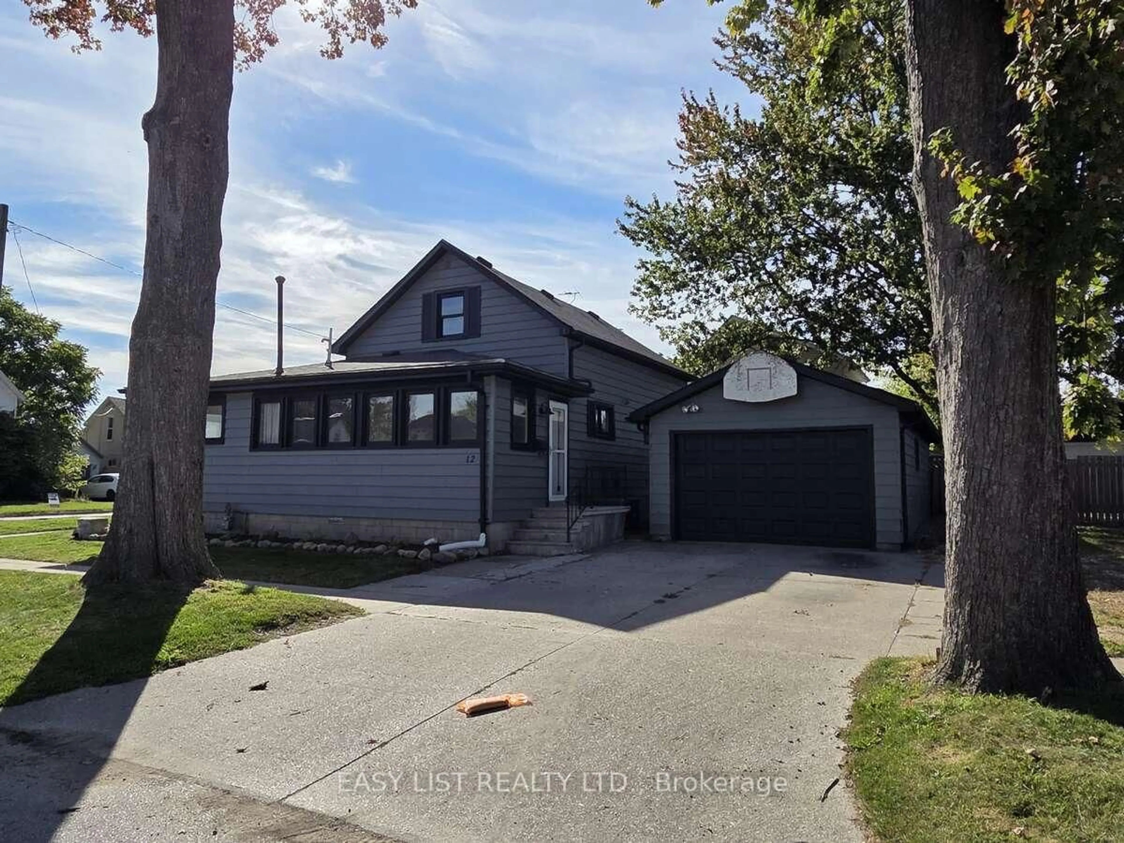 A pic from outside/outdoor area/front of a property/back of a property/a pic from drone, street for 12 Montgomery St, Leamington Ontario N8H 1Z9