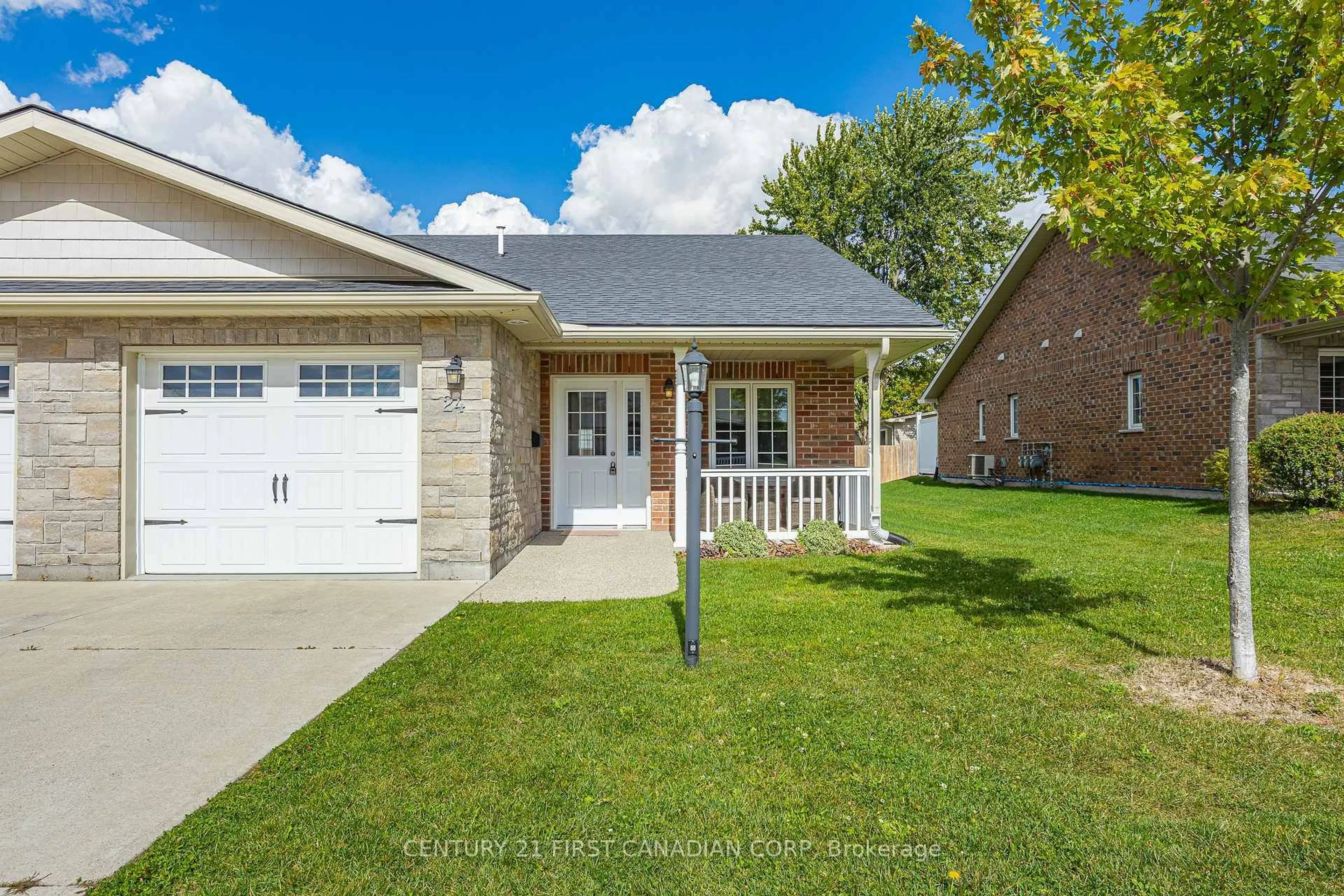 Home with brick exterior material, street for 24 Devon Dr, South Huron Ontario N0M 1S3