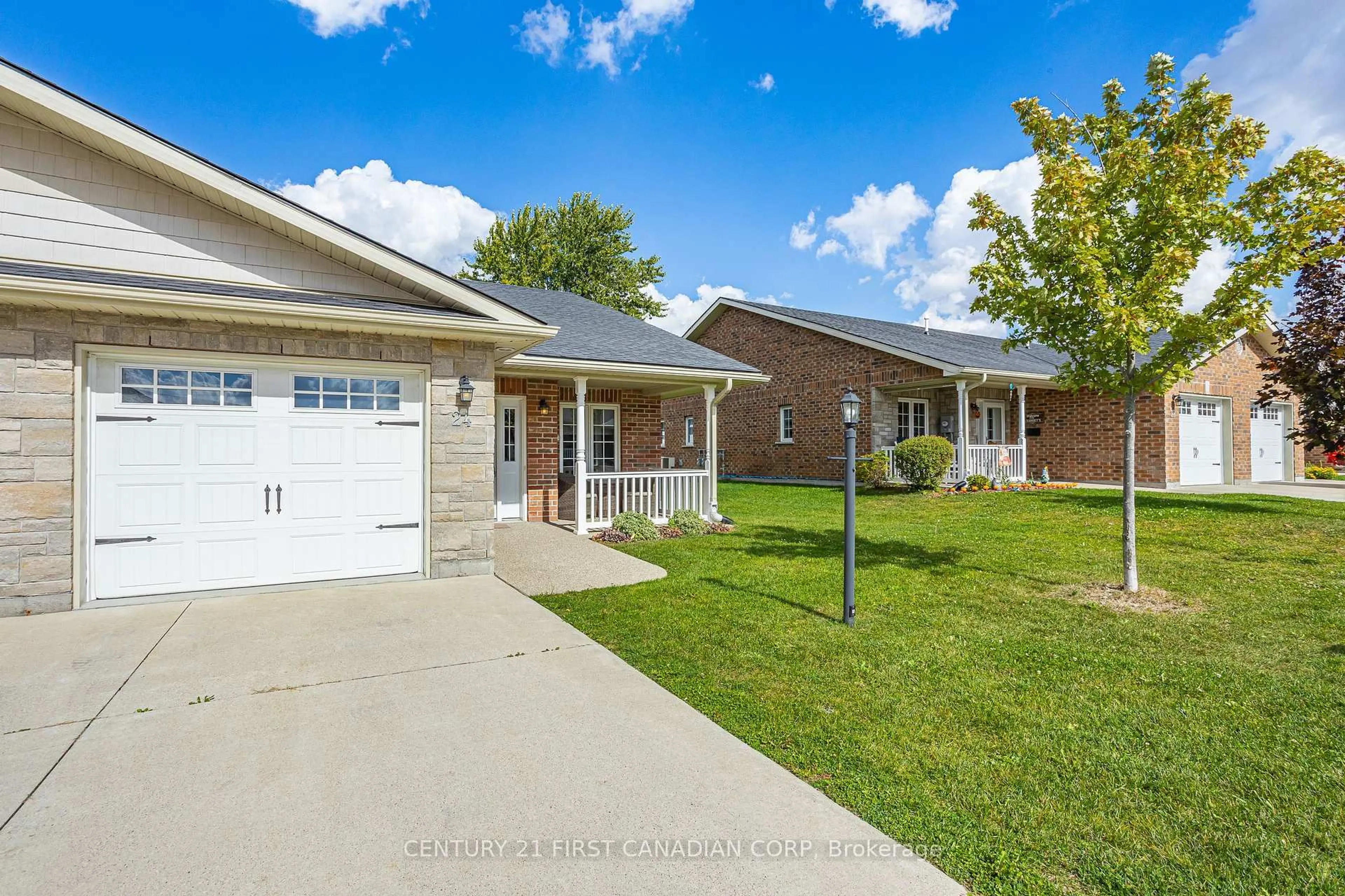 Home with brick exterior material, street for 24 Devon Dr, South Huron Ontario N0M 1S3