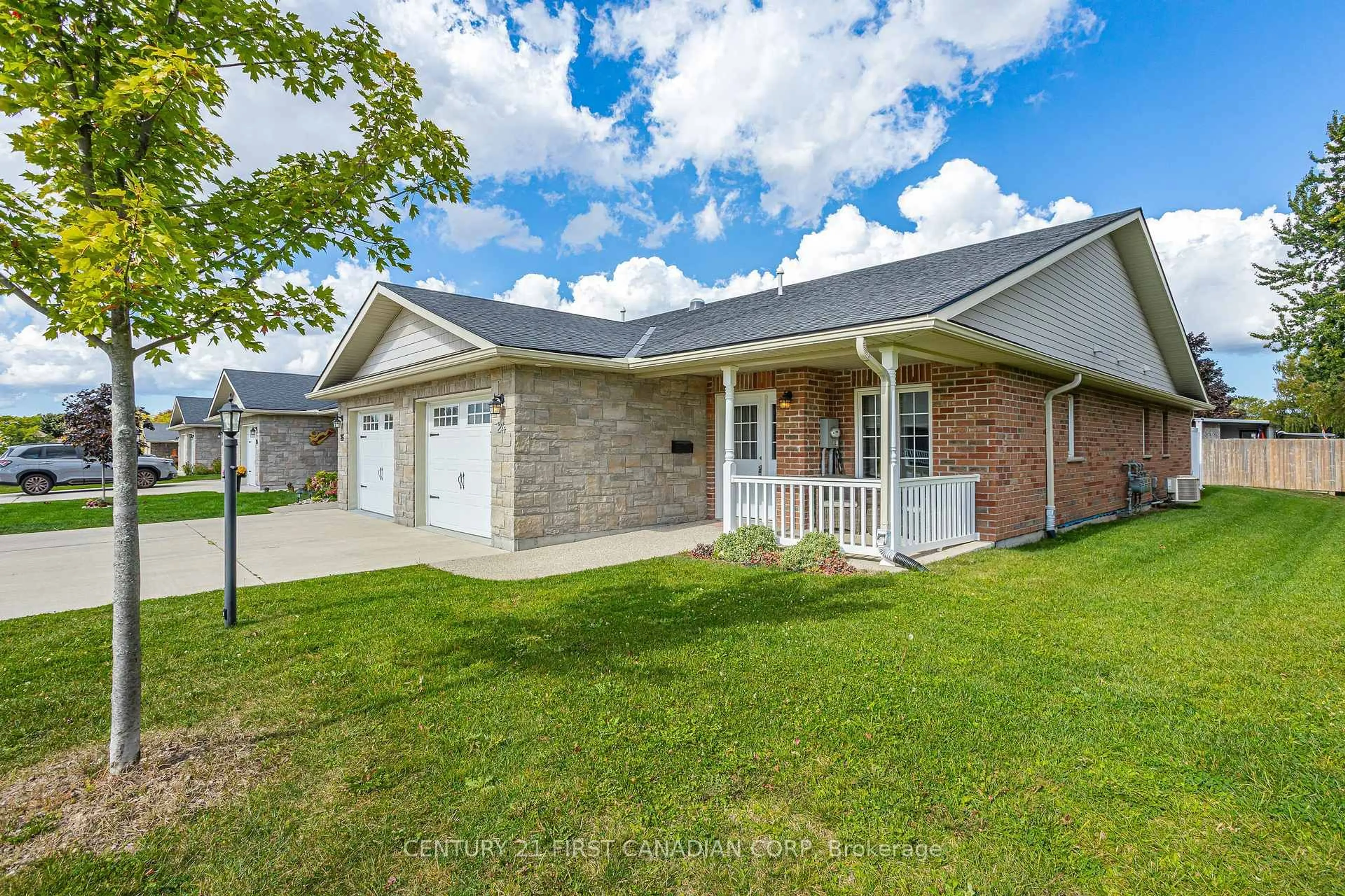 Home with brick exterior material, street for 24 Devon Dr, South Huron Ontario N0M 1S3