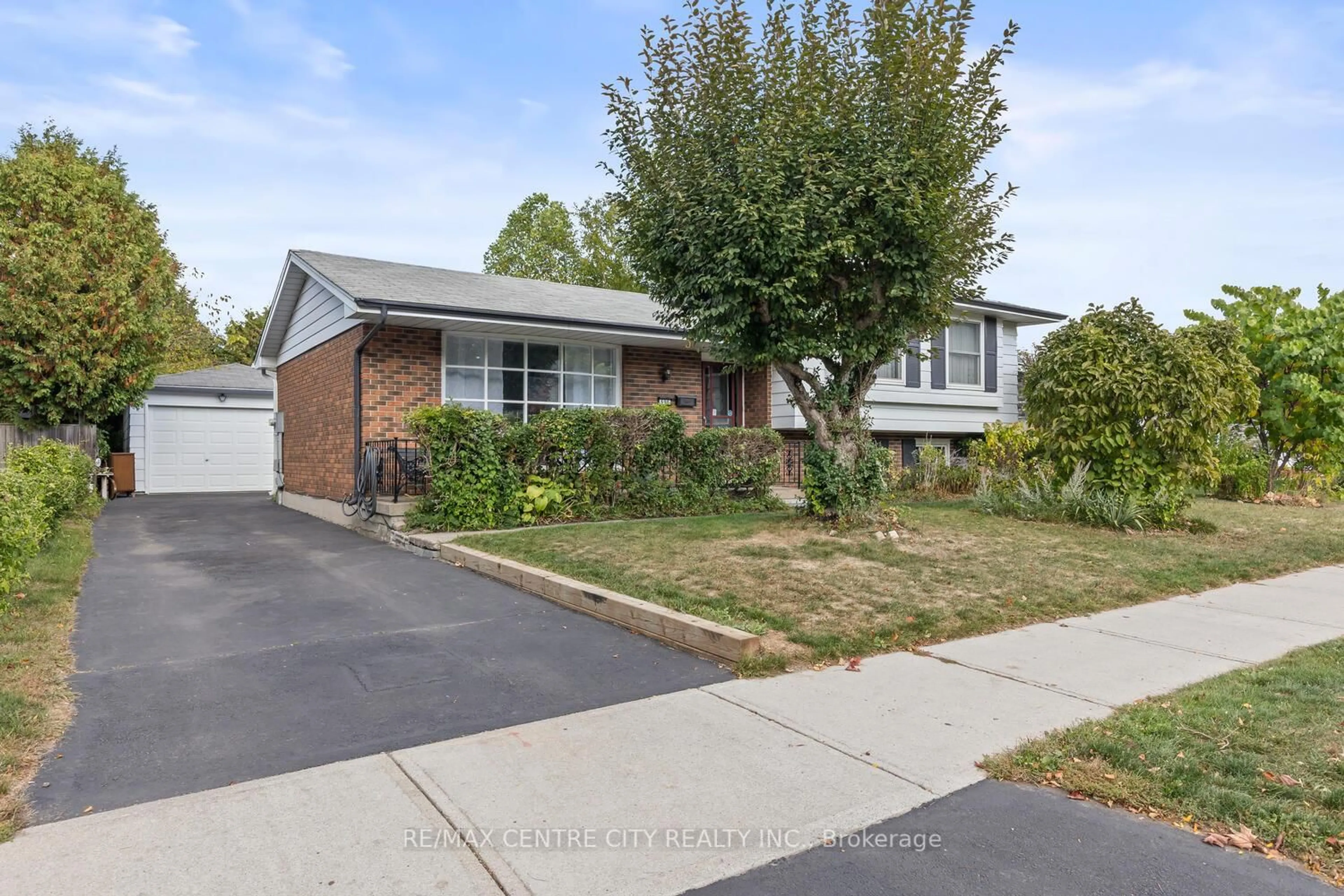 Home with brick exterior material, street for 690 Grenfell Dr, London North Ontario N5X 2C5