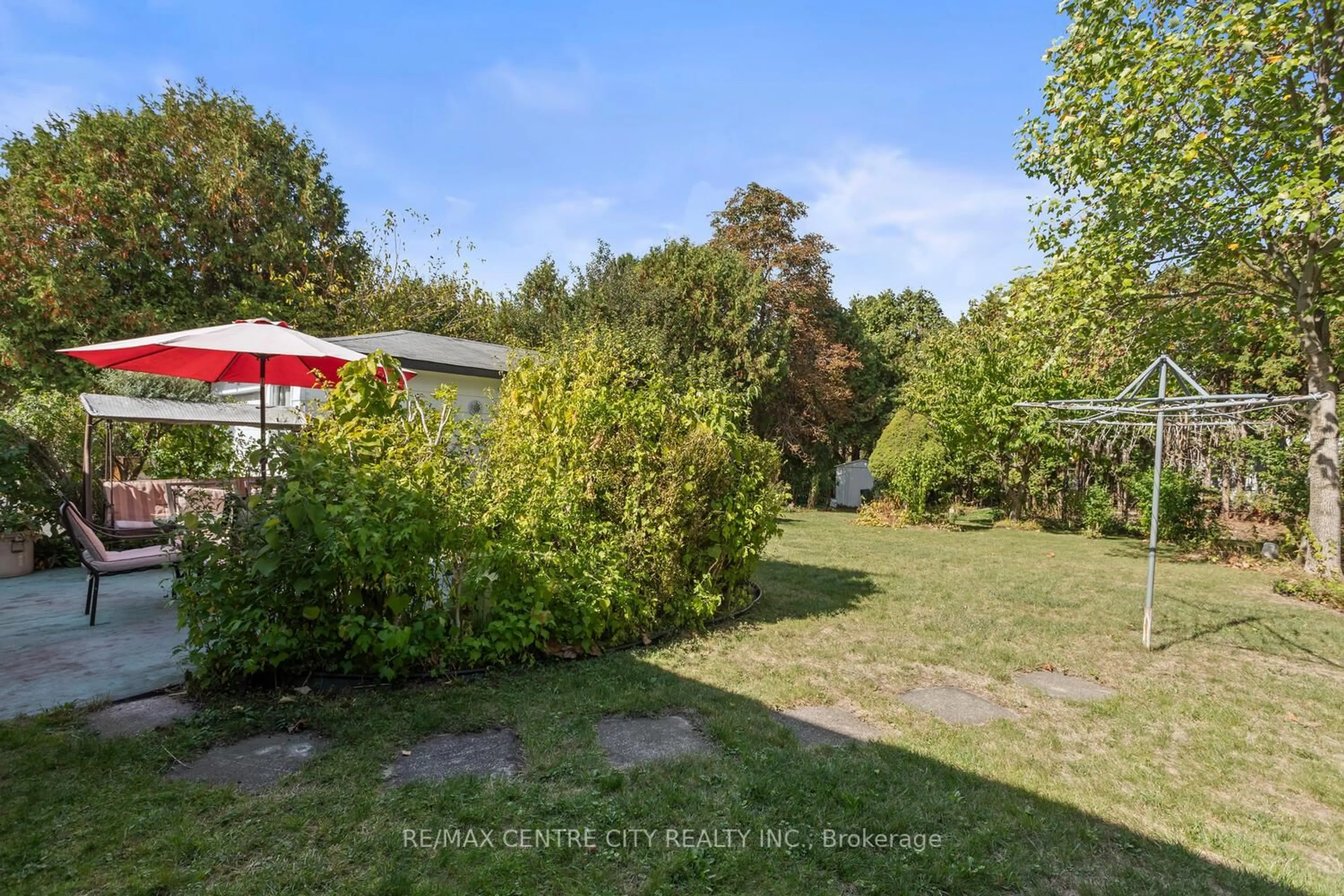 A pic from outside/outdoor area/front of a property/back of a property/a pic from drone, forest/trees view for 690 Grenfell Dr, London North Ontario N5X 2C5