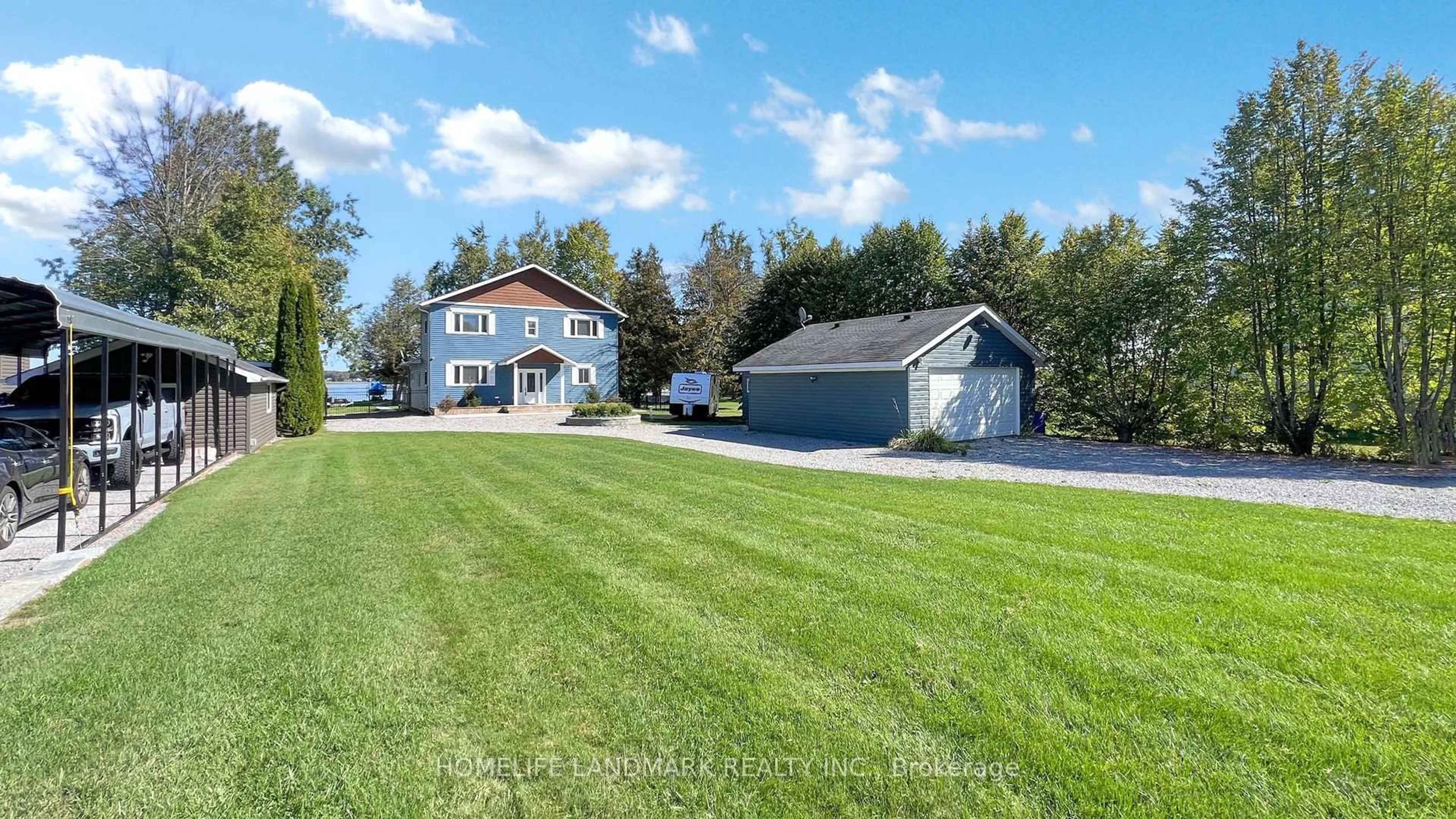 A pic from outside/outdoor area/front of a property/back of a property/a pic from drone, water/lake/river/ocean view for 208 Lakeshore Dr, Kawartha Lakes Ontario K0M 1A0