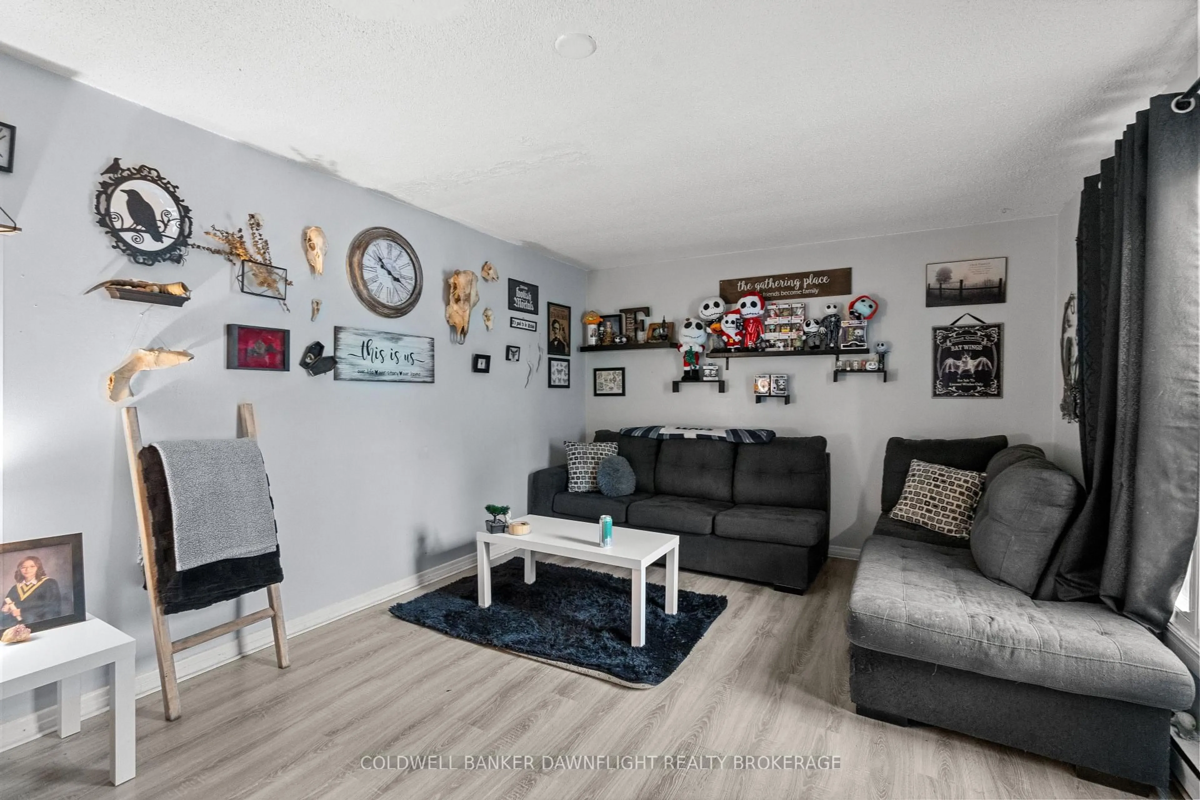 Living room with furniture, wood/laminate floor for 31 St Charles Pl #31, Huron East Ontario N0M 1L0