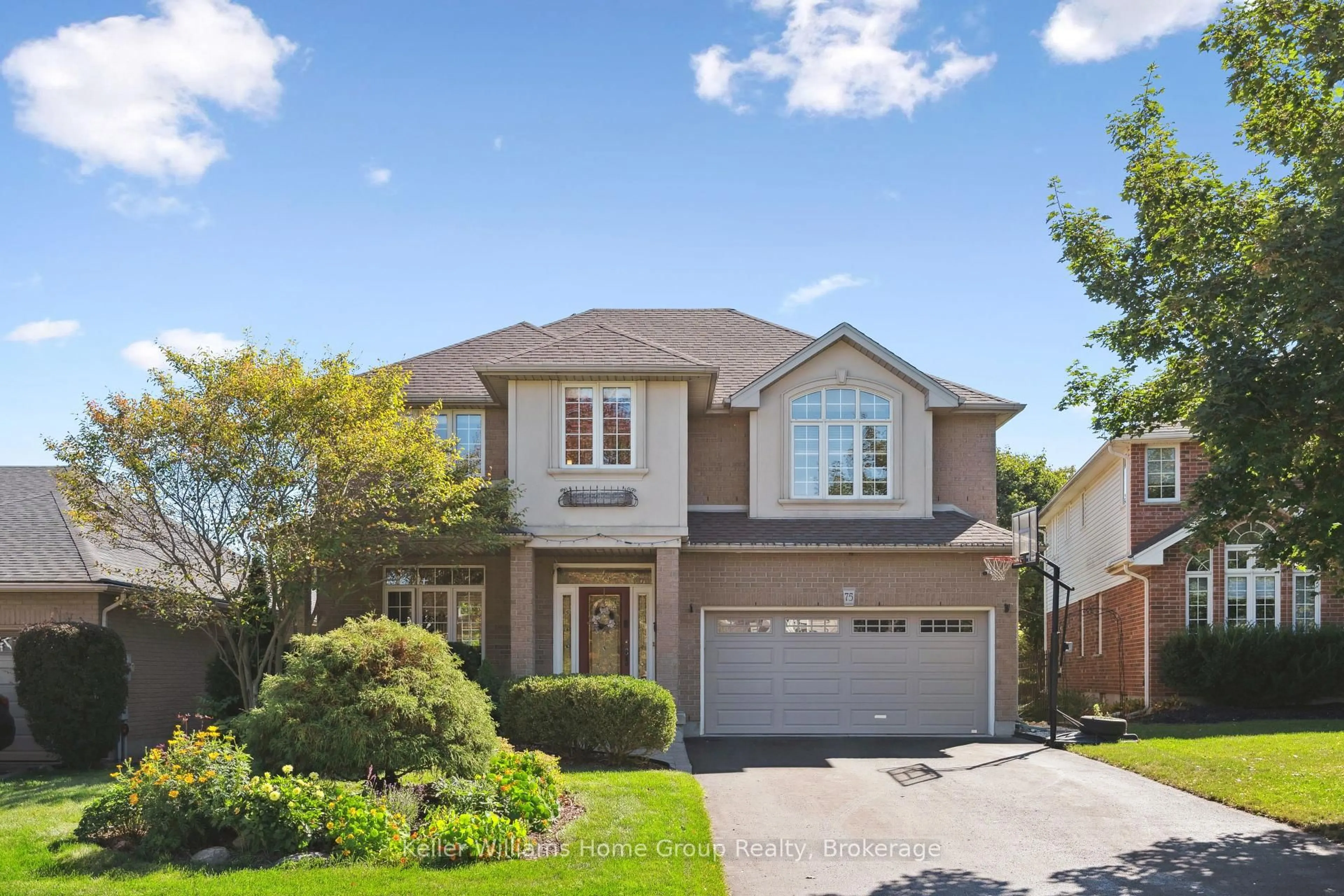 Home with brick exterior material, street for 75 Hazelwood Dr, Guelph Ontario N1C 1A4