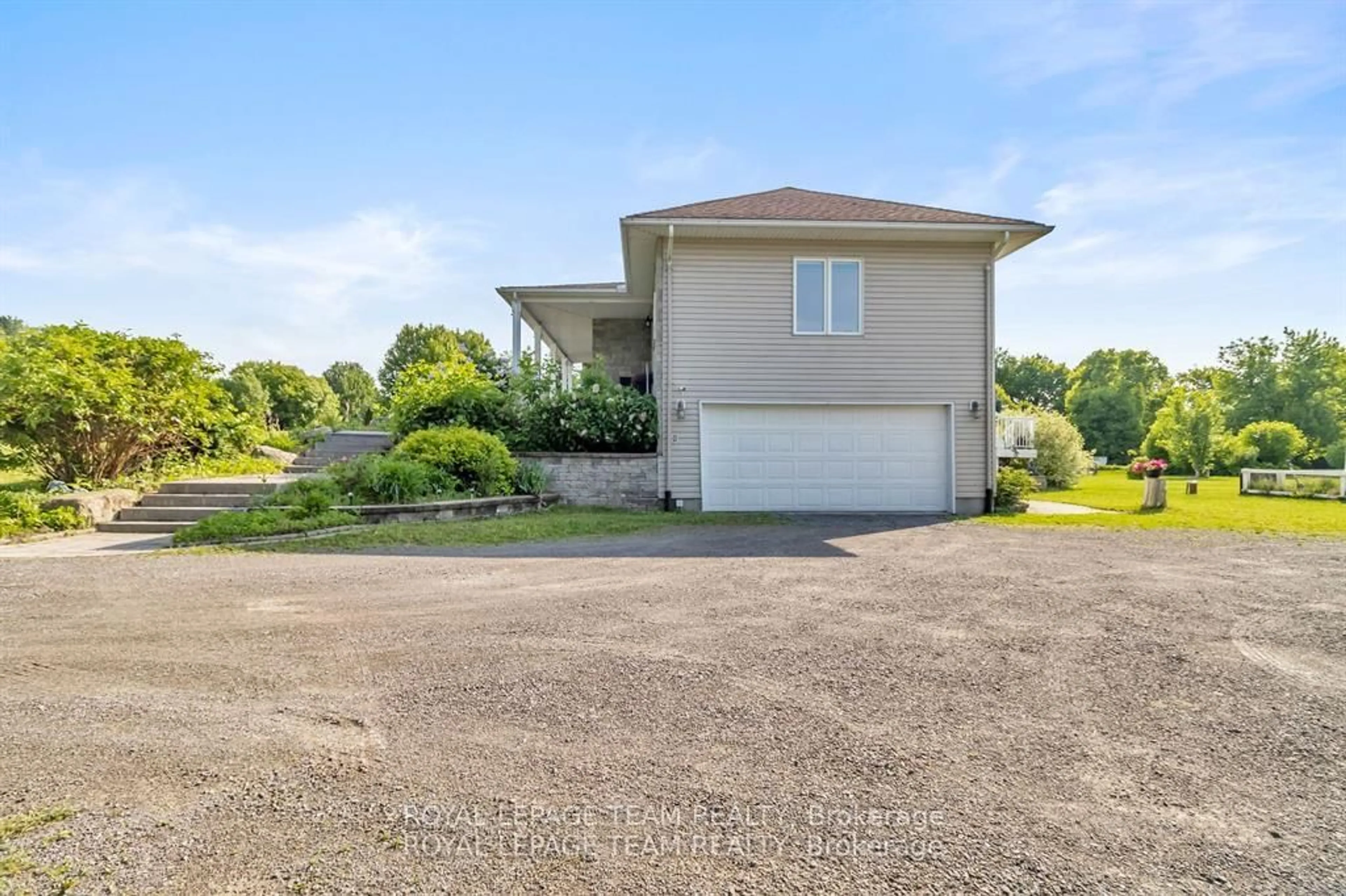 A pic from outside/outdoor area/front of a property/back of a property/a pic from drone, water/lake/river/ocean view for 5705 Lombardy Dr, Osgoode Ontario K0A 2W0