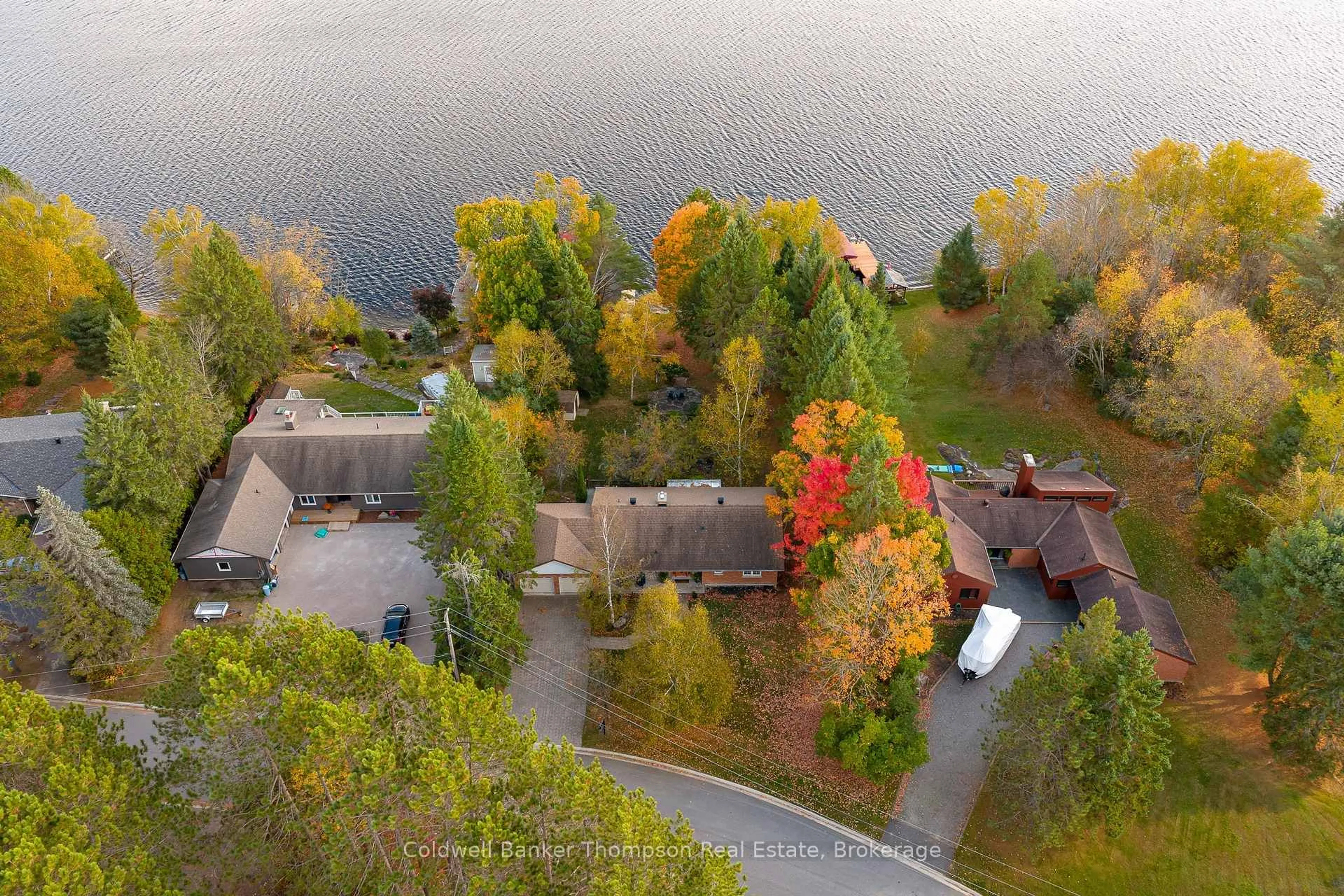 A pic from outside/outdoor area/front of a property/back of a property/a pic from drone, water/lake/river/ocean view for 281 Echo Bay Rd, Huntsville Ontario P1H 1R4
