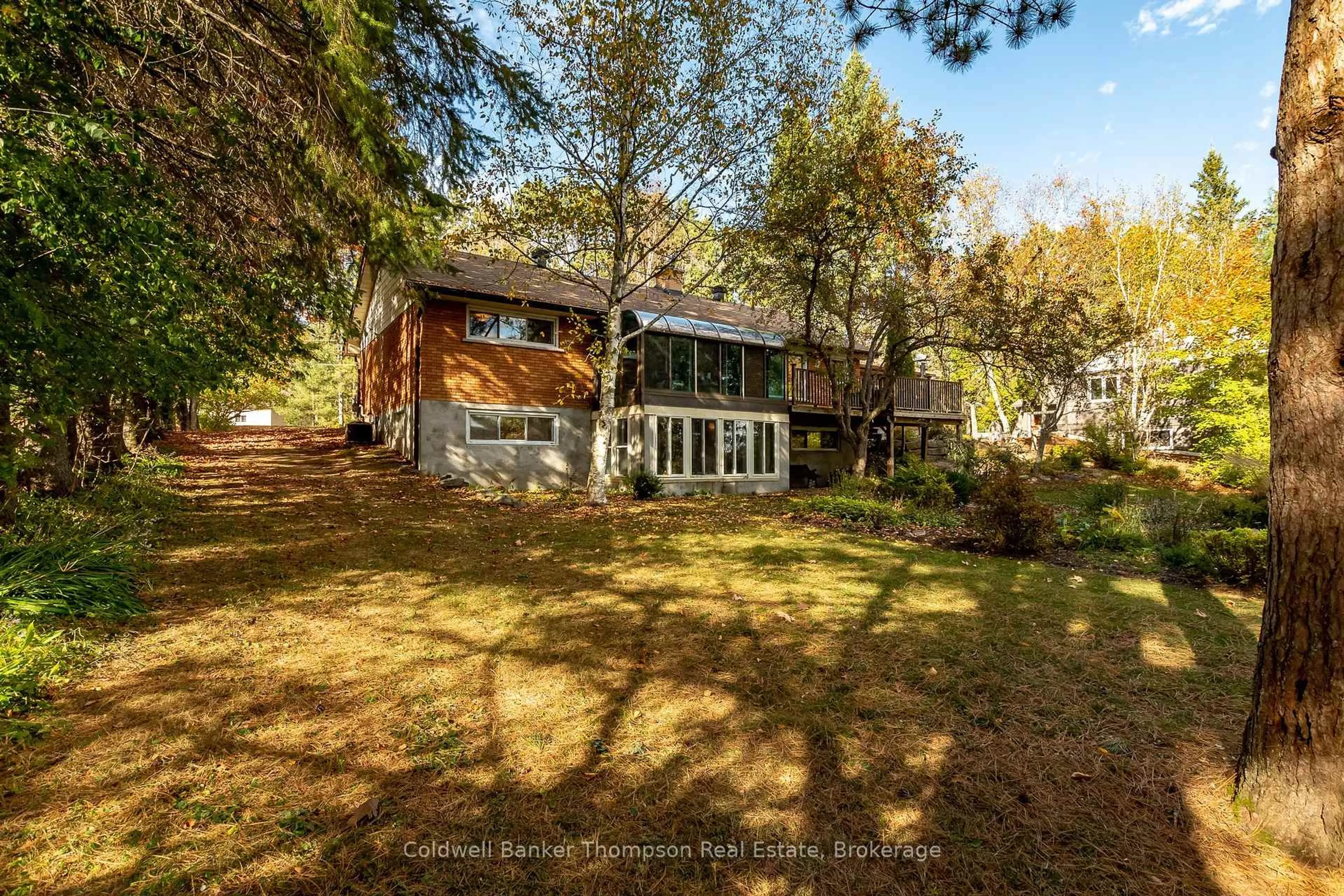 A pic from outside/outdoor area/front of a property/back of a property/a pic from drone, water/lake/river/ocean view for 281 Echo Bay Rd, Huntsville Ontario P1H 1R4