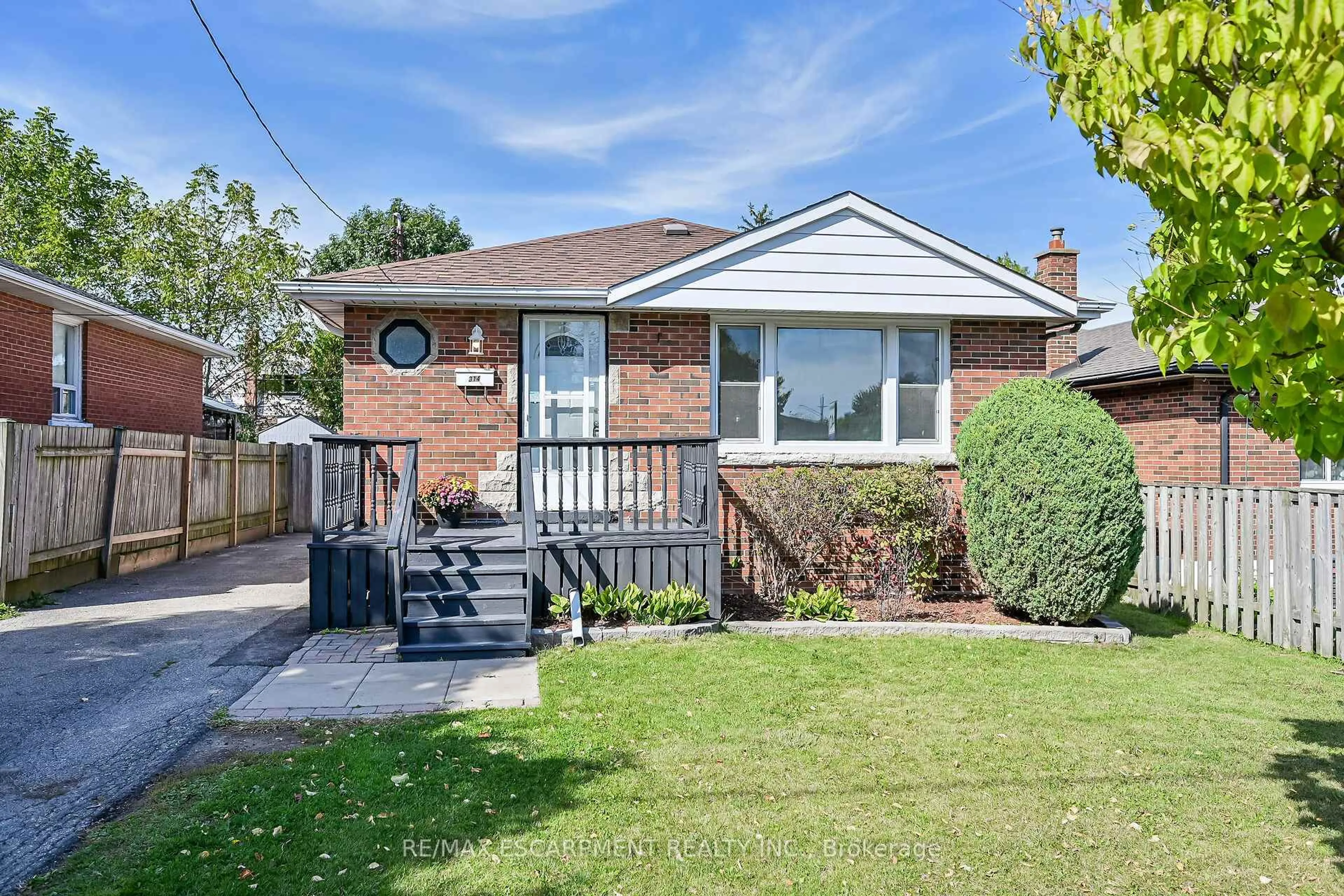 Home with brick exterior material, street for 314 East 16th St, Hamilton Ontario L9A 4J9