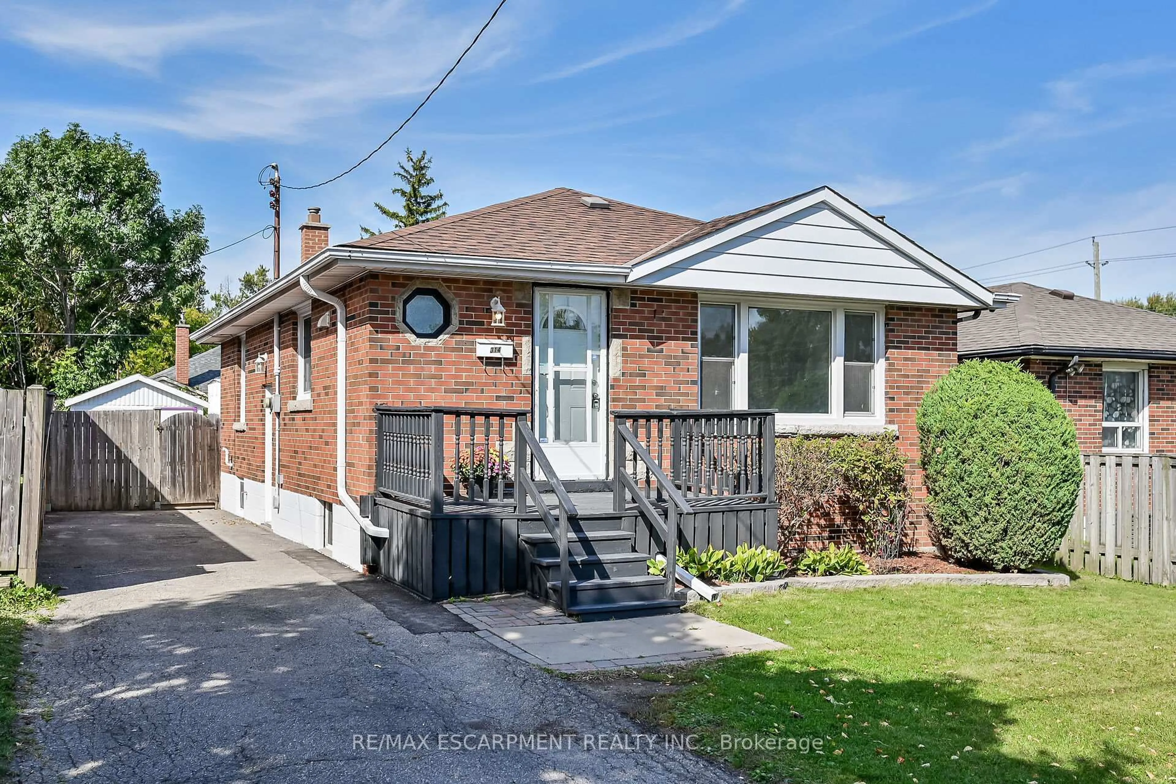 Home with brick exterior material, street for 314 East 16th St, Hamilton Ontario L9A 4J9