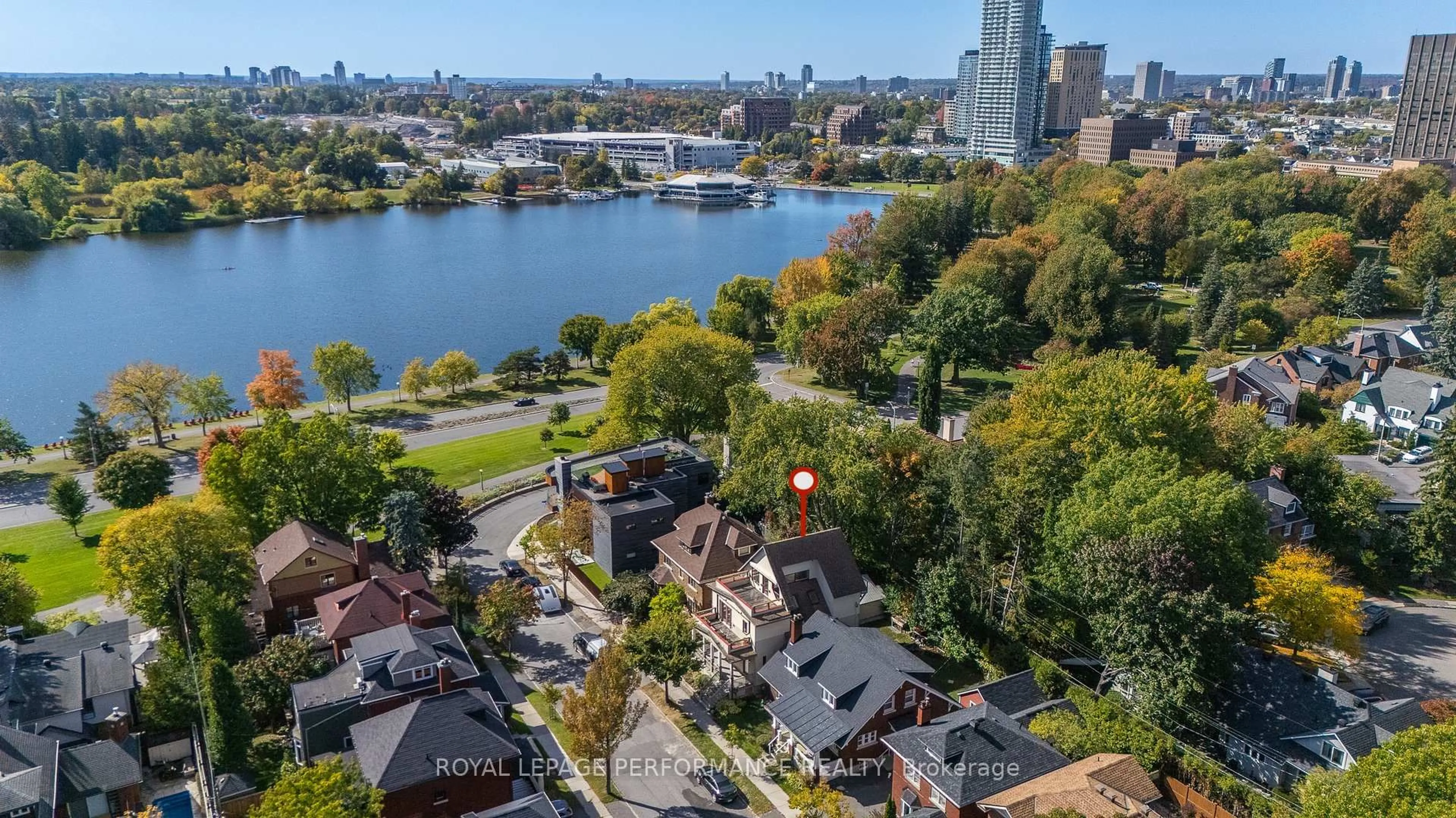 A pic from outside/outdoor area/front of a property/back of a property/a pic from drone, water/lake/river/ocean view for 45 Old Sunset Blvd, Ottawa Ontario K1S 3G8
