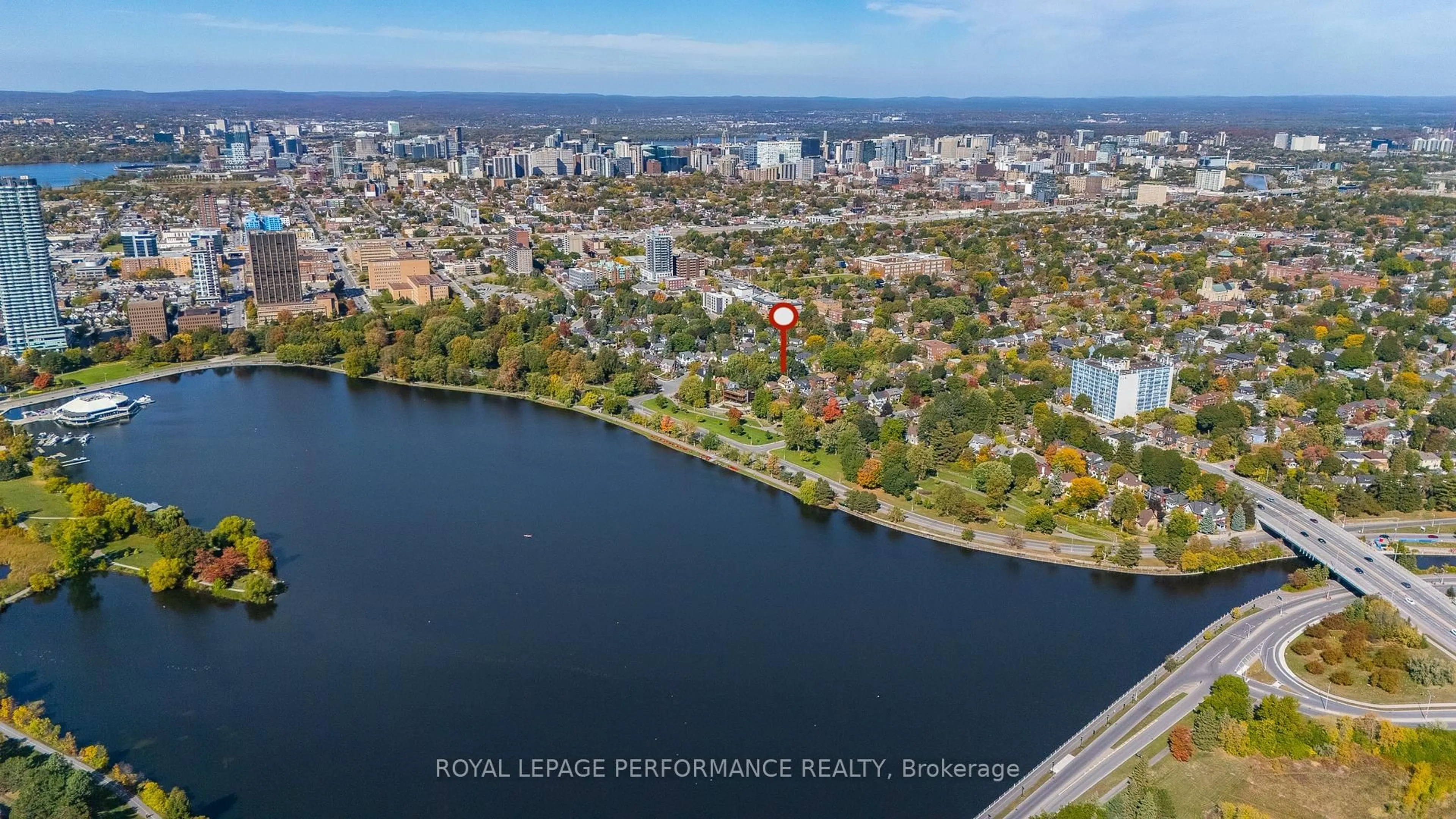A pic from outside/outdoor area/front of a property/back of a property/a pic from drone, water/lake/river/ocean view for 45 Old Sunset Blvd, Ottawa Ontario K1S 3G8