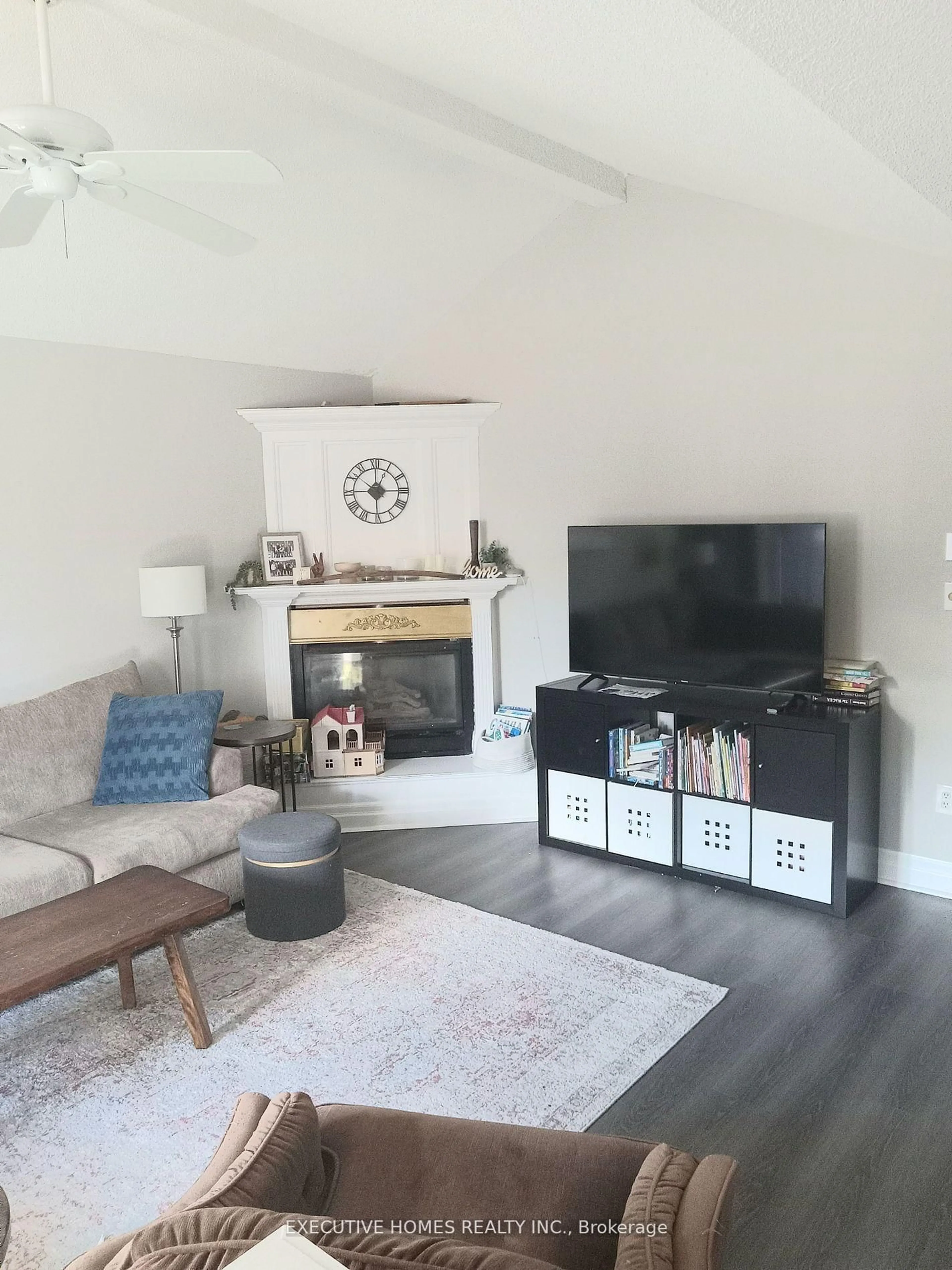Living room with furniture, wood/laminate floor for 125 Municipal St, Guelph Ontario N1G 4R1