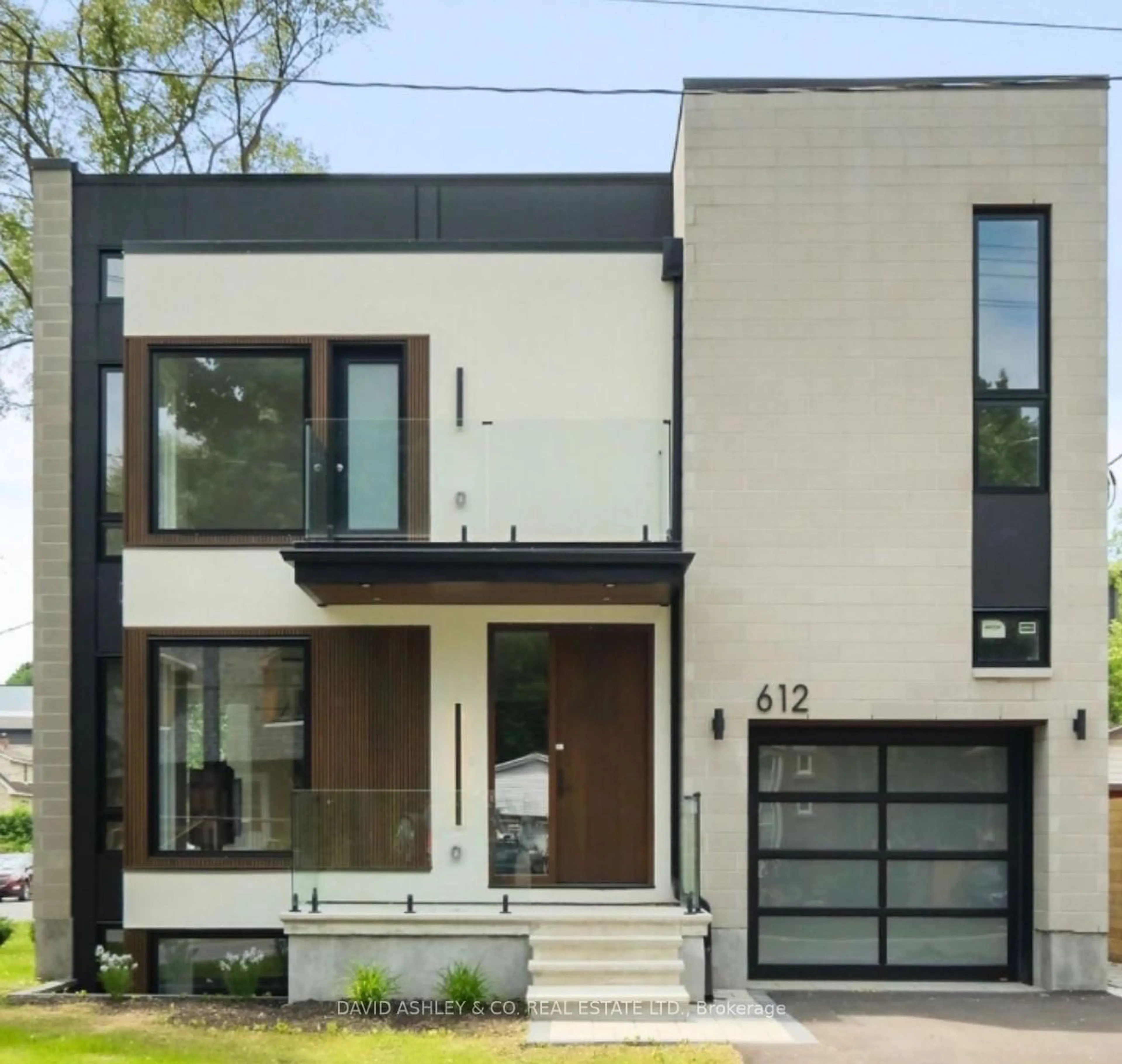 Home with brick exterior material, street for 612 Tweedsmuir Ave, Ottawa Ontario K1Z 5P3