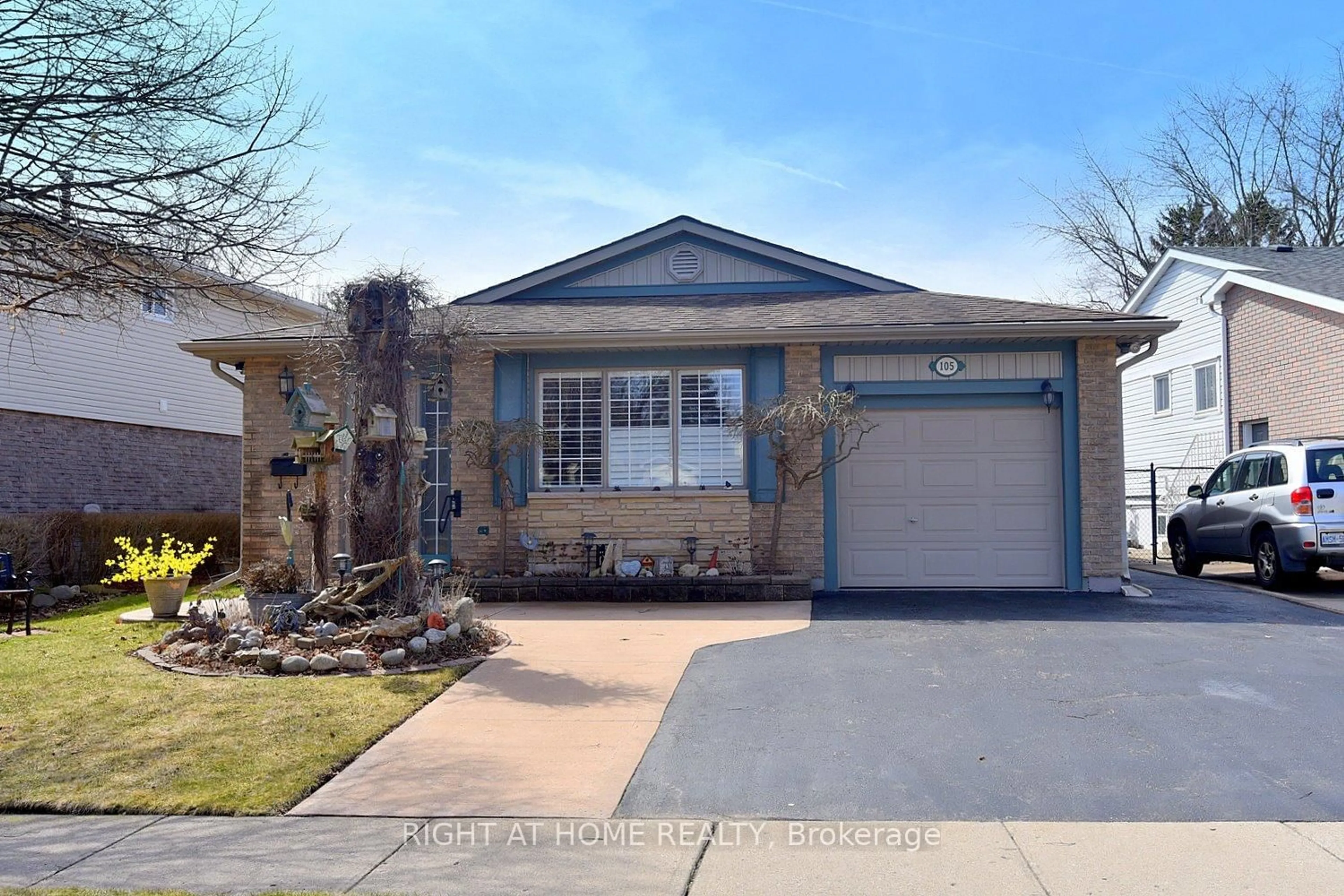 Home with vinyl exterior material, street for 105 Bismark Dr, Cambridge Ontario N1S 4E8