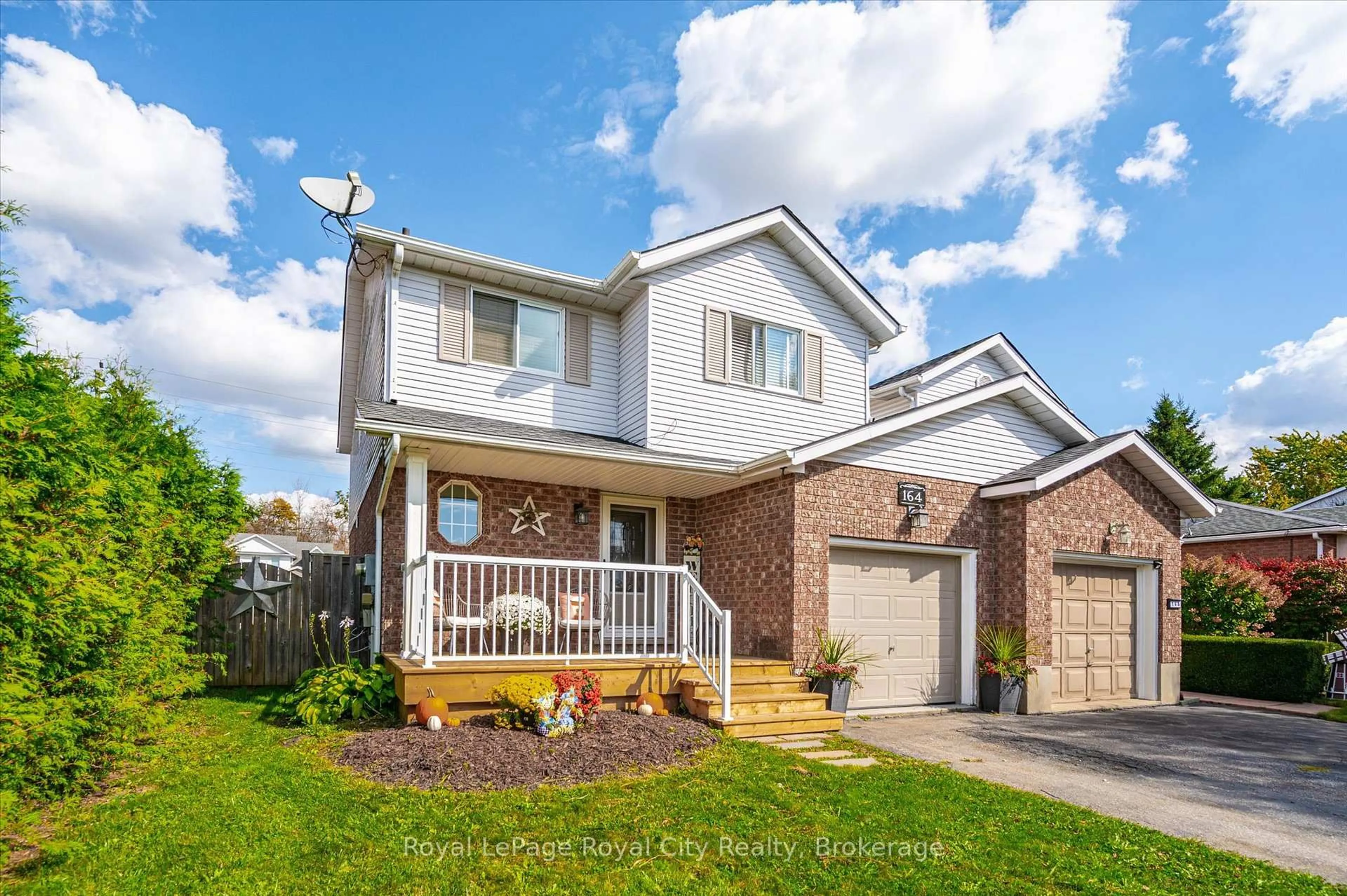 Home with brick exterior material, street for 164 Tait Cres, Centre Wellington Ontario N1M 3P5
