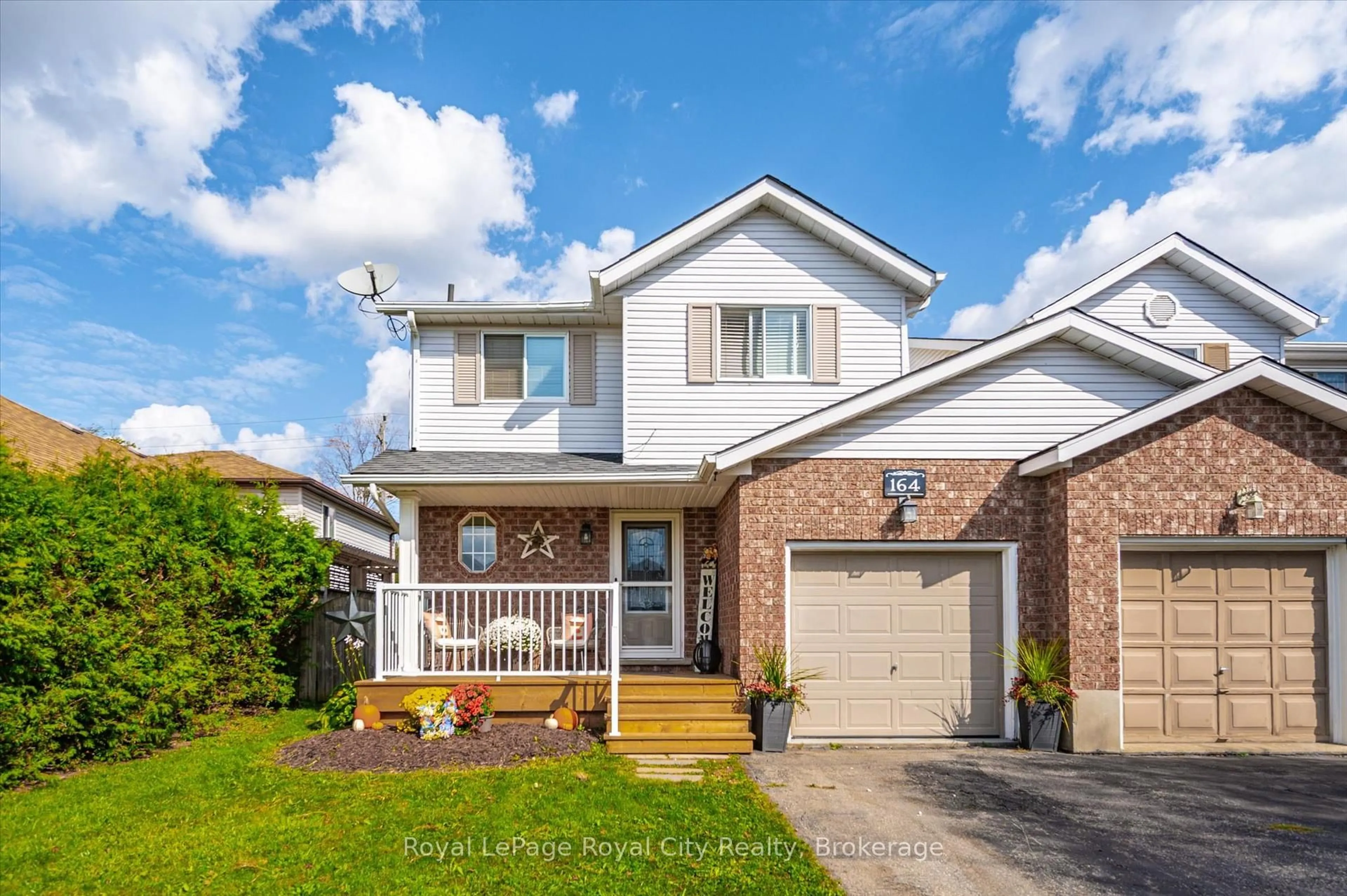 Home with brick exterior material, street for 164 Tait Cres, Centre Wellington Ontario N1M 3P5