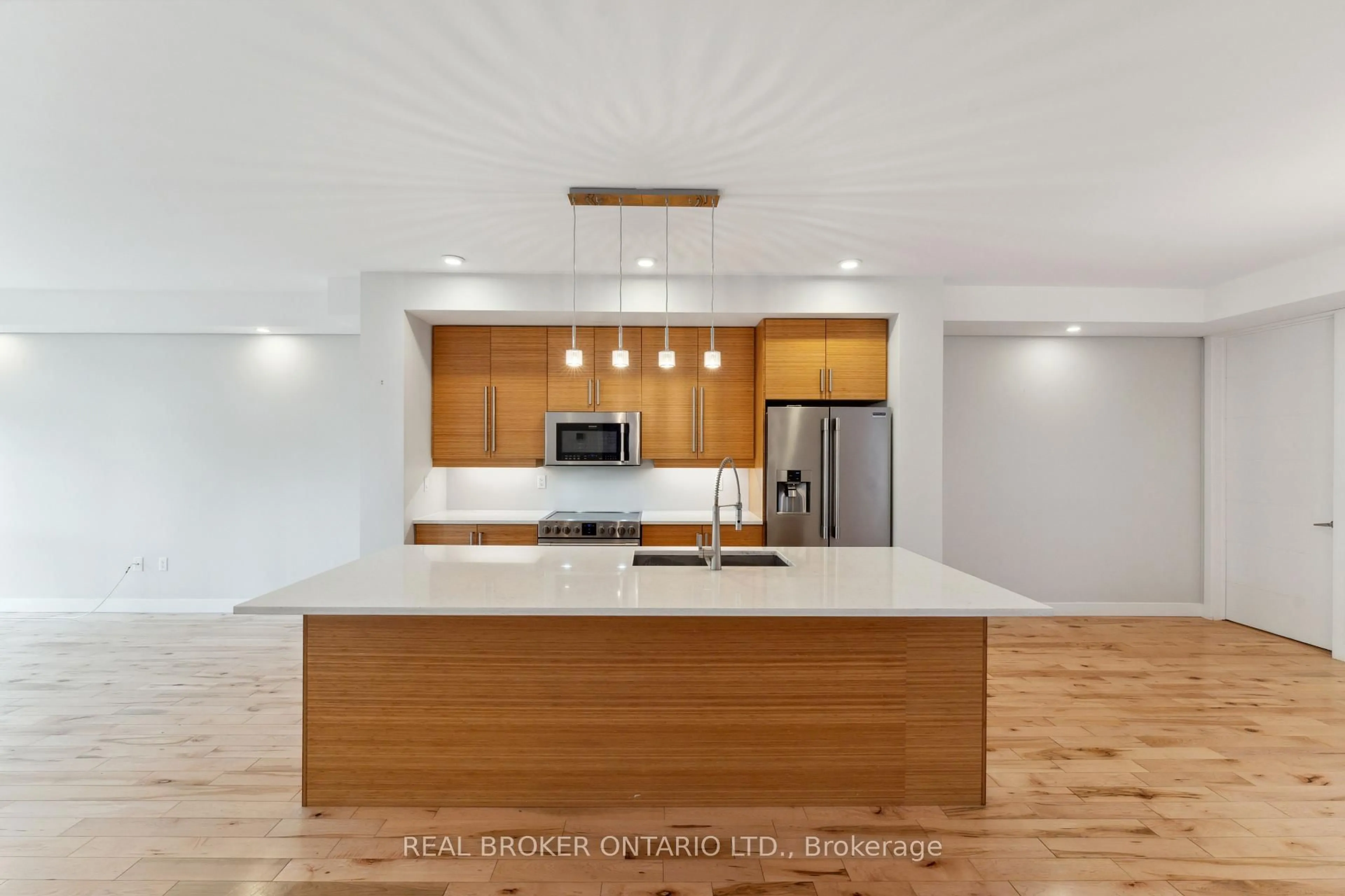 Open concept kitchen, wood/laminate floor for 36 Ontario St, Ottawa Ontario K1K 1L1