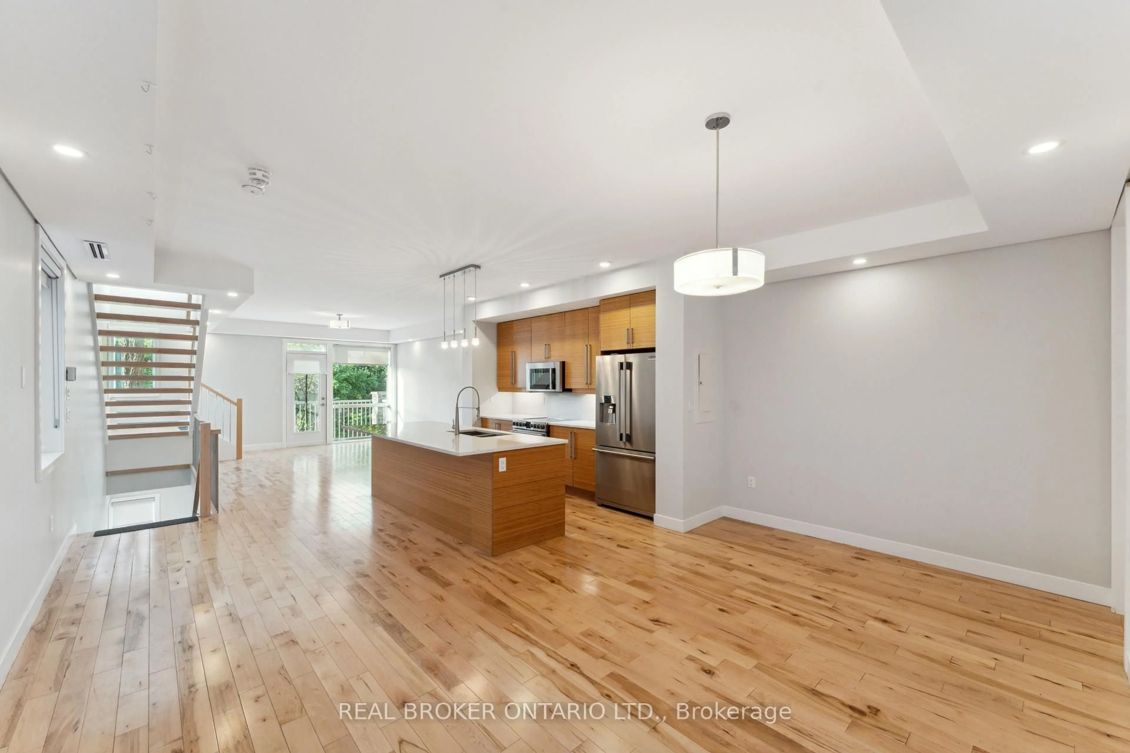 Open concept kitchen, wood/laminate floor for 36 Ontario St, Ottawa Ontario K1K 1L1