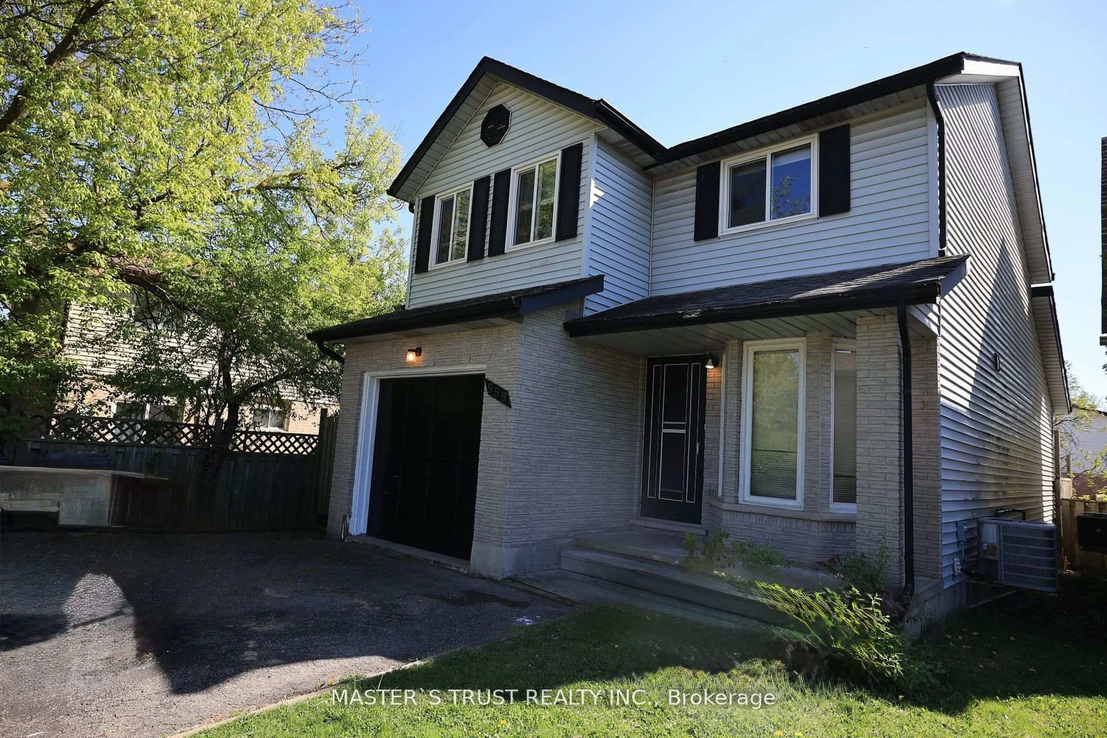 Home with vinyl exterior material, street for 559 Edinburgh Rd, Guelph Ontario N1G 4E7