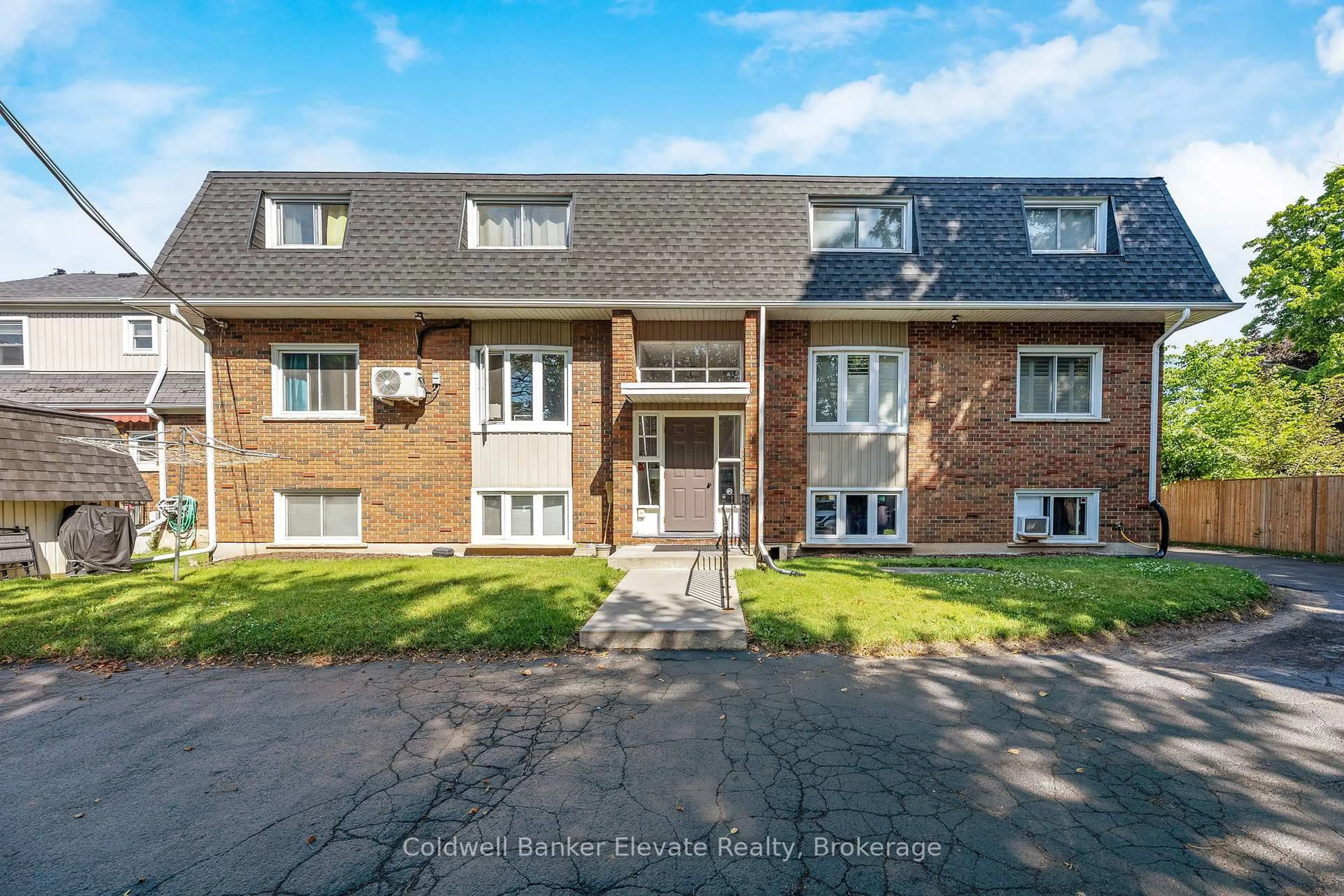 A pic from outside/outdoor area/front of a property/back of a property/a pic from drone, street for 233 Westminster Dr #24, Cambridge Ontario N3H 1T2
