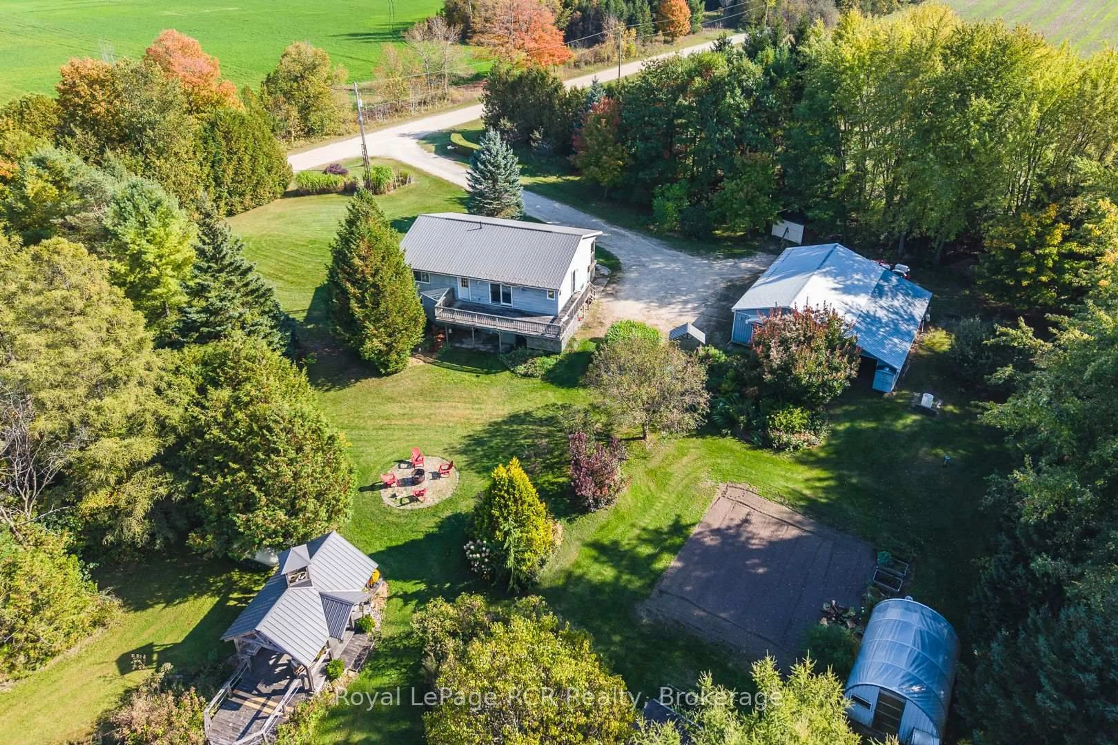 A pic from outside/outdoor area/front of a property/back of a property/a pic from drone, unknown for 74074 10 Sdrd, West Grey Ontario N0G 1S0