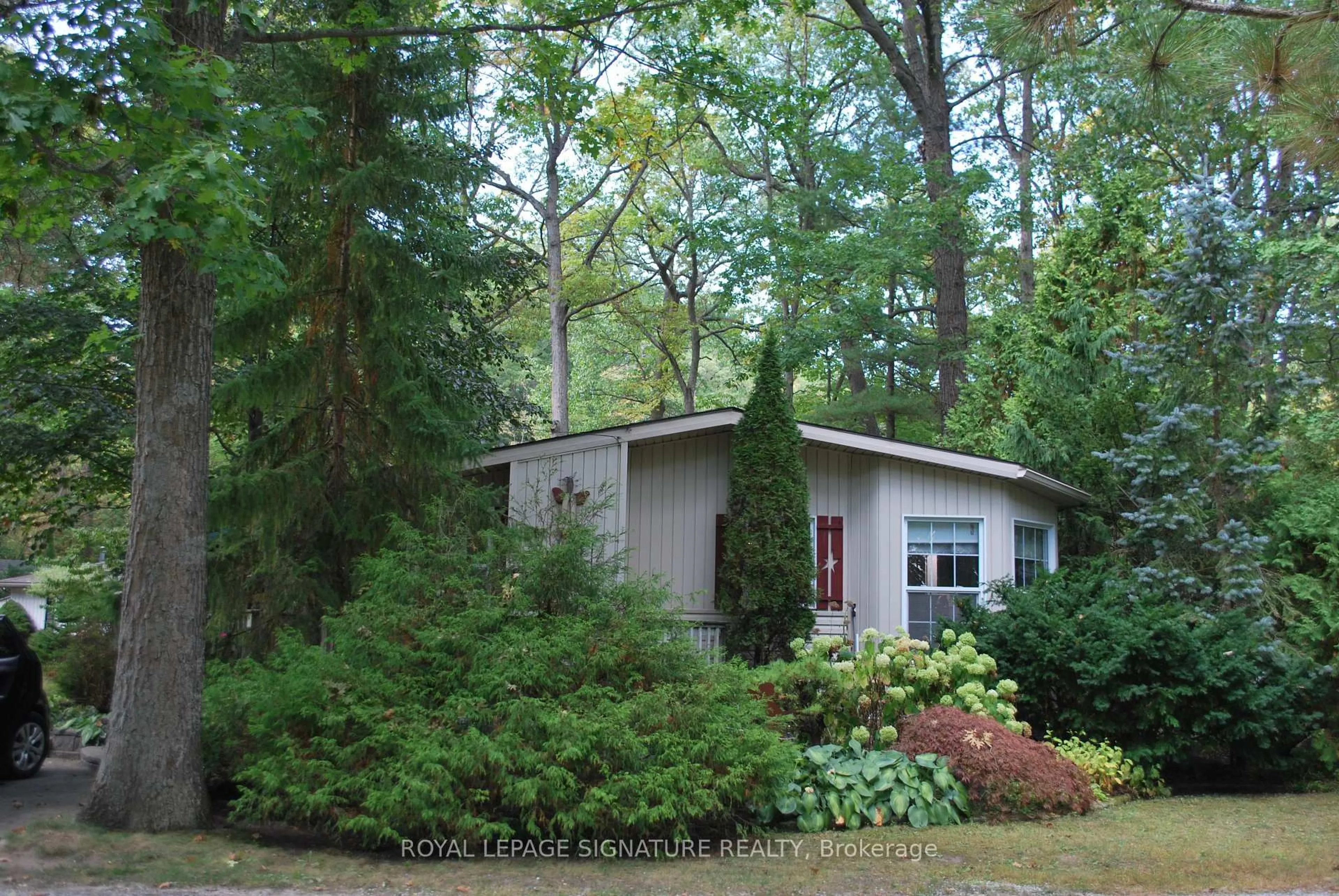 Home with vinyl exterior material, forest/trees view for 9910 Northville Cres #A37, Lambton Shores Ontario N0M 2N0