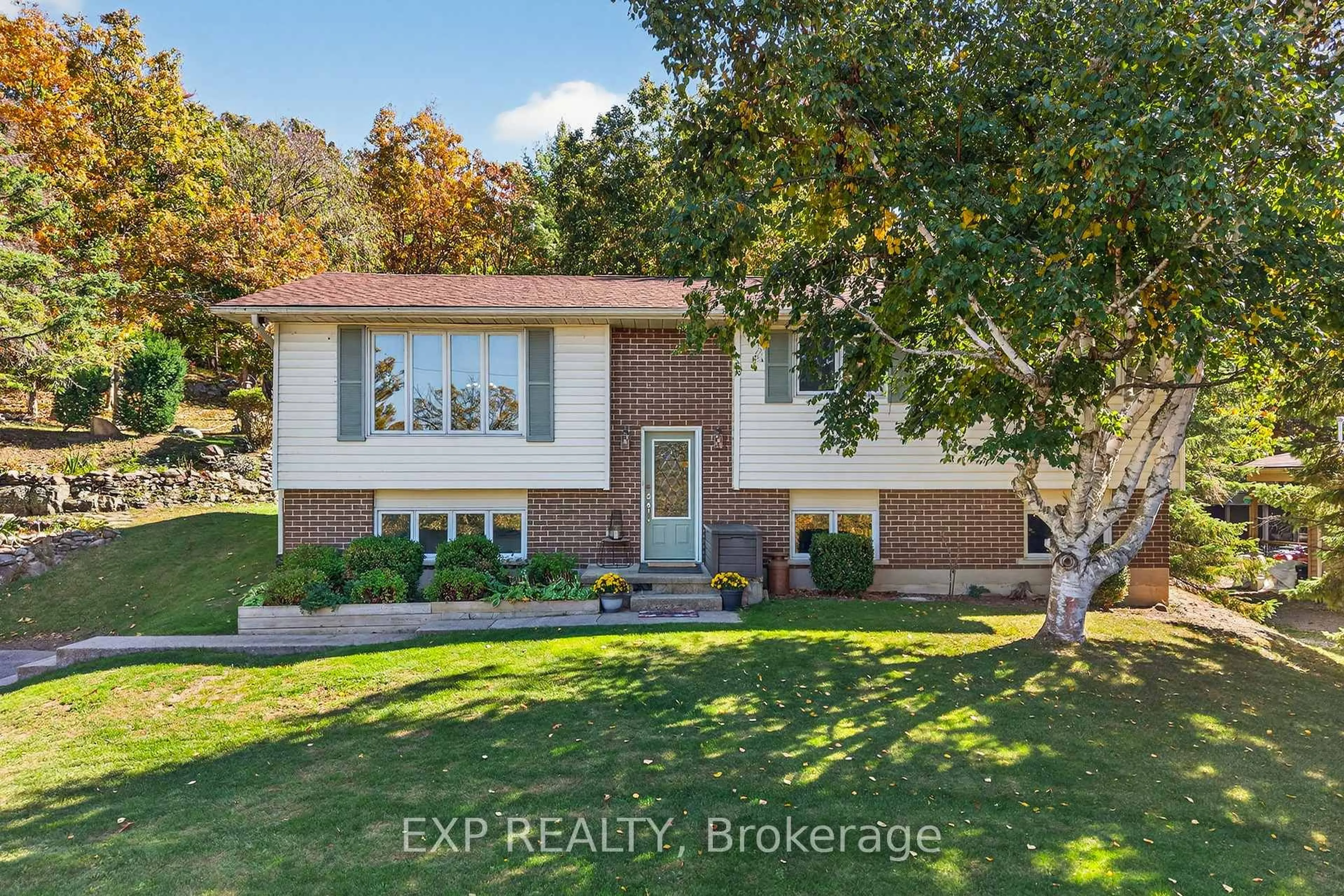 Home with vinyl exterior material, street for 3127 2 Highway, Kingston Ontario K7L 5H6