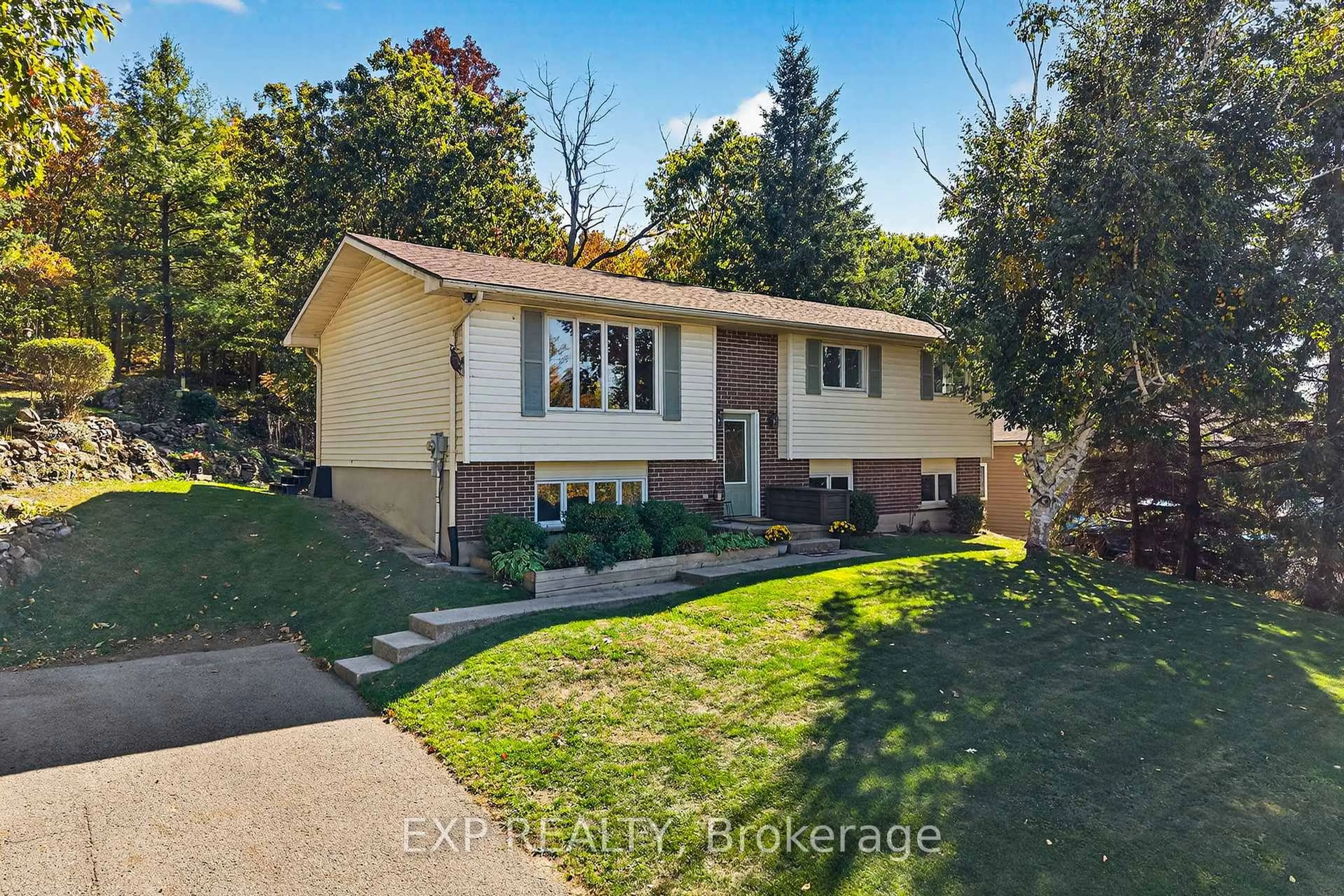 Home with vinyl exterior material, street for 3127 2 Highway, Kingston Ontario K7L 5H6