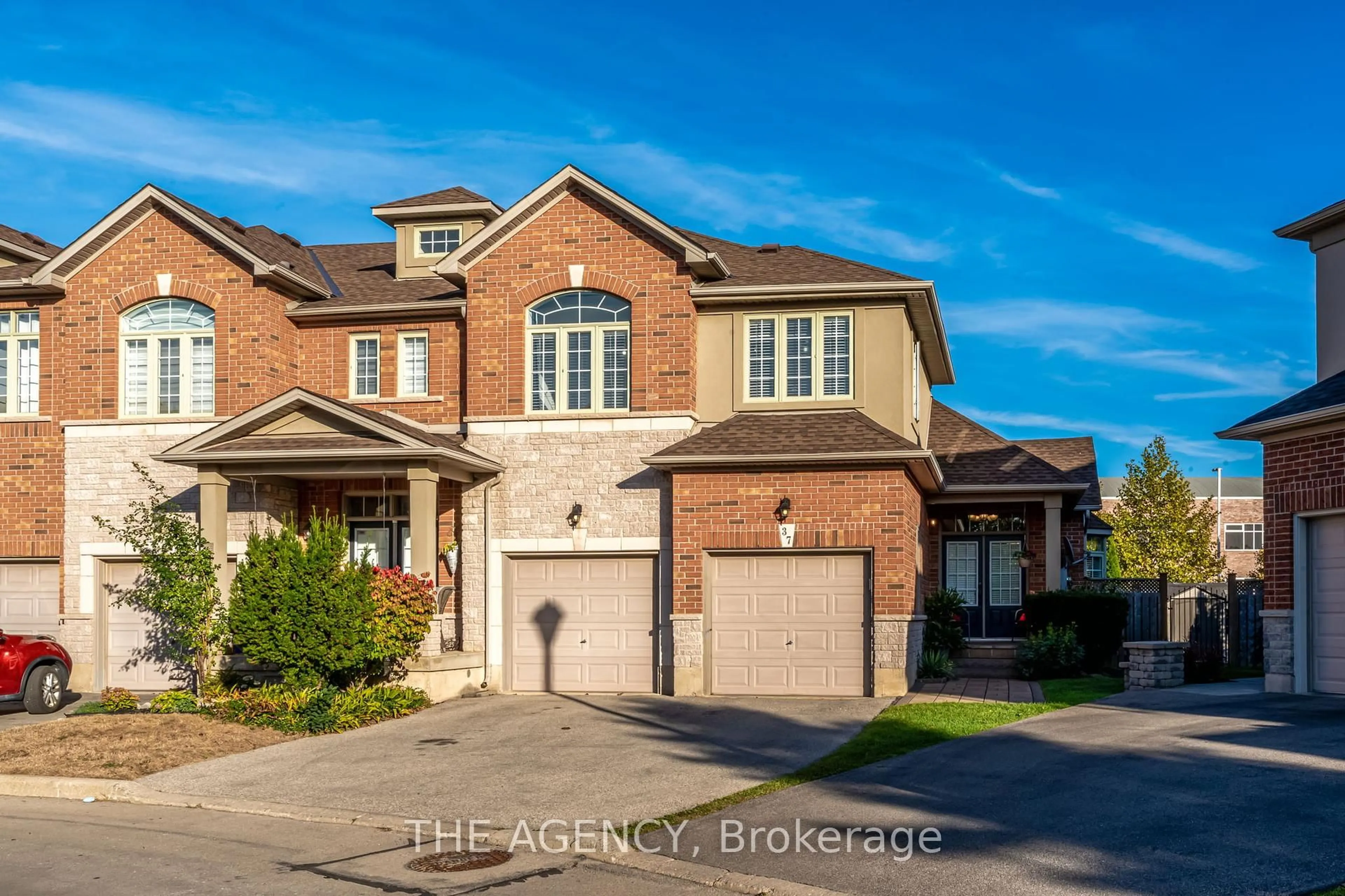 Home with brick exterior material, street for 99 Panabaker Dr #37, Hamilton Ontario L9G 0A3