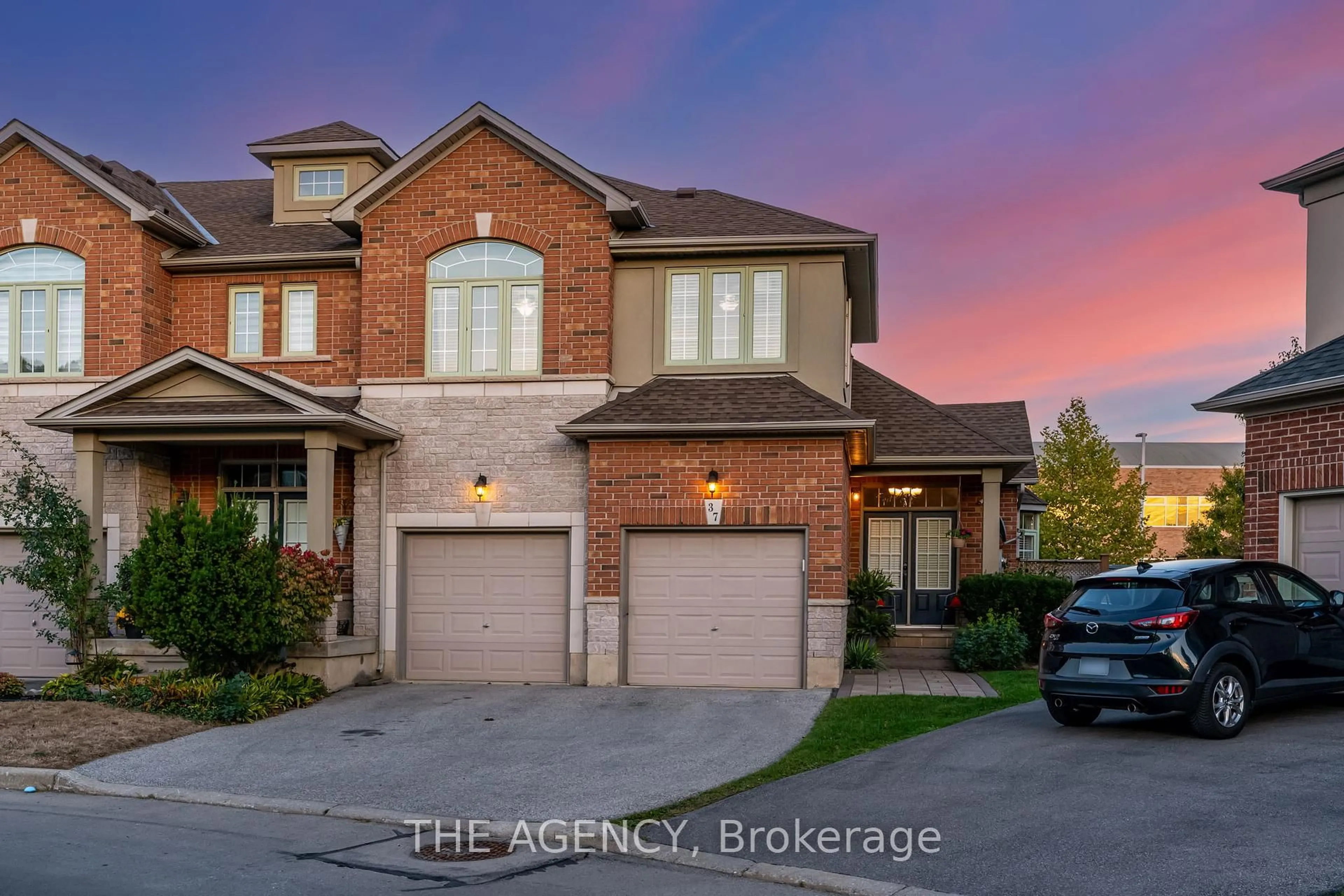 Home with brick exterior material, street for 99 Panabaker Dr #37, Hamilton Ontario L9G 0A3
