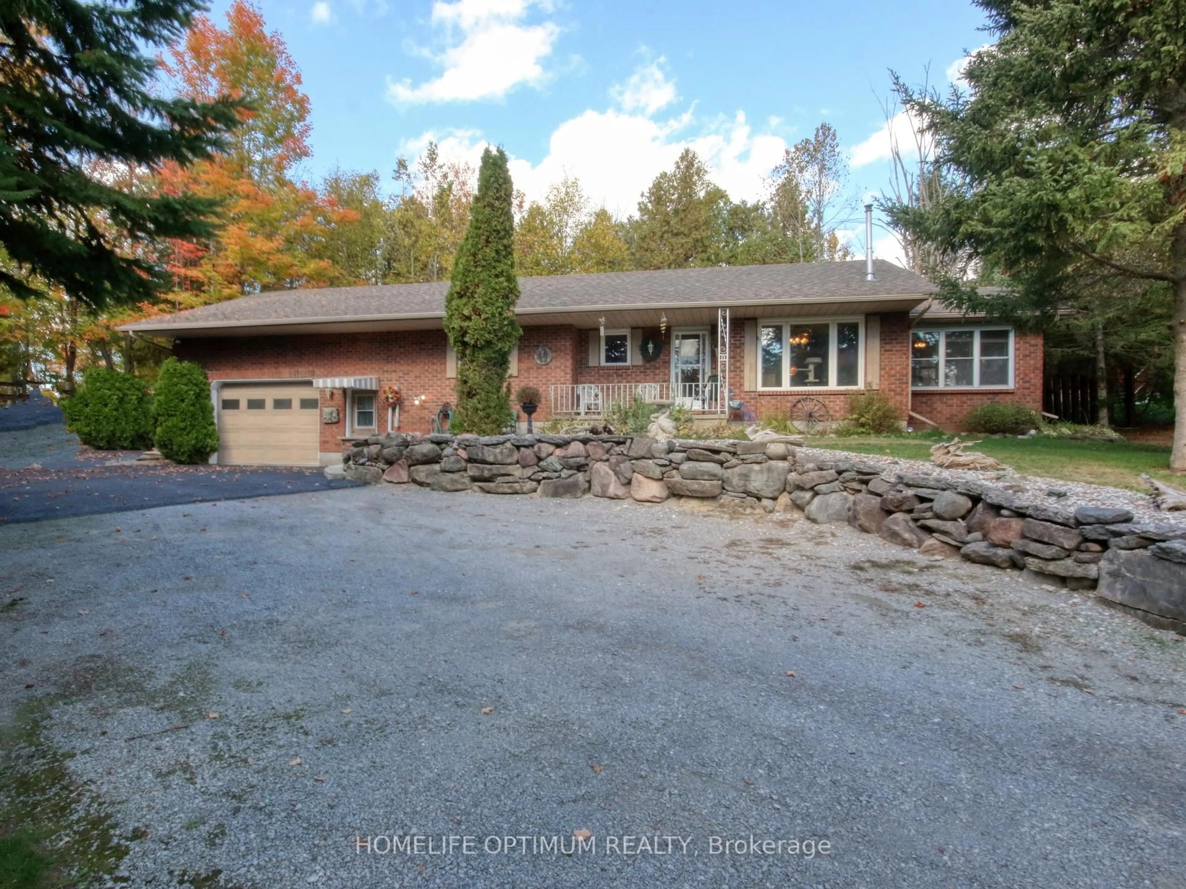 A pic from outside/outdoor area/front of a property/back of a property/a pic from drone, street for 228 Pirates Glen Dr, Trent Lakes Ontario K0M 1A0