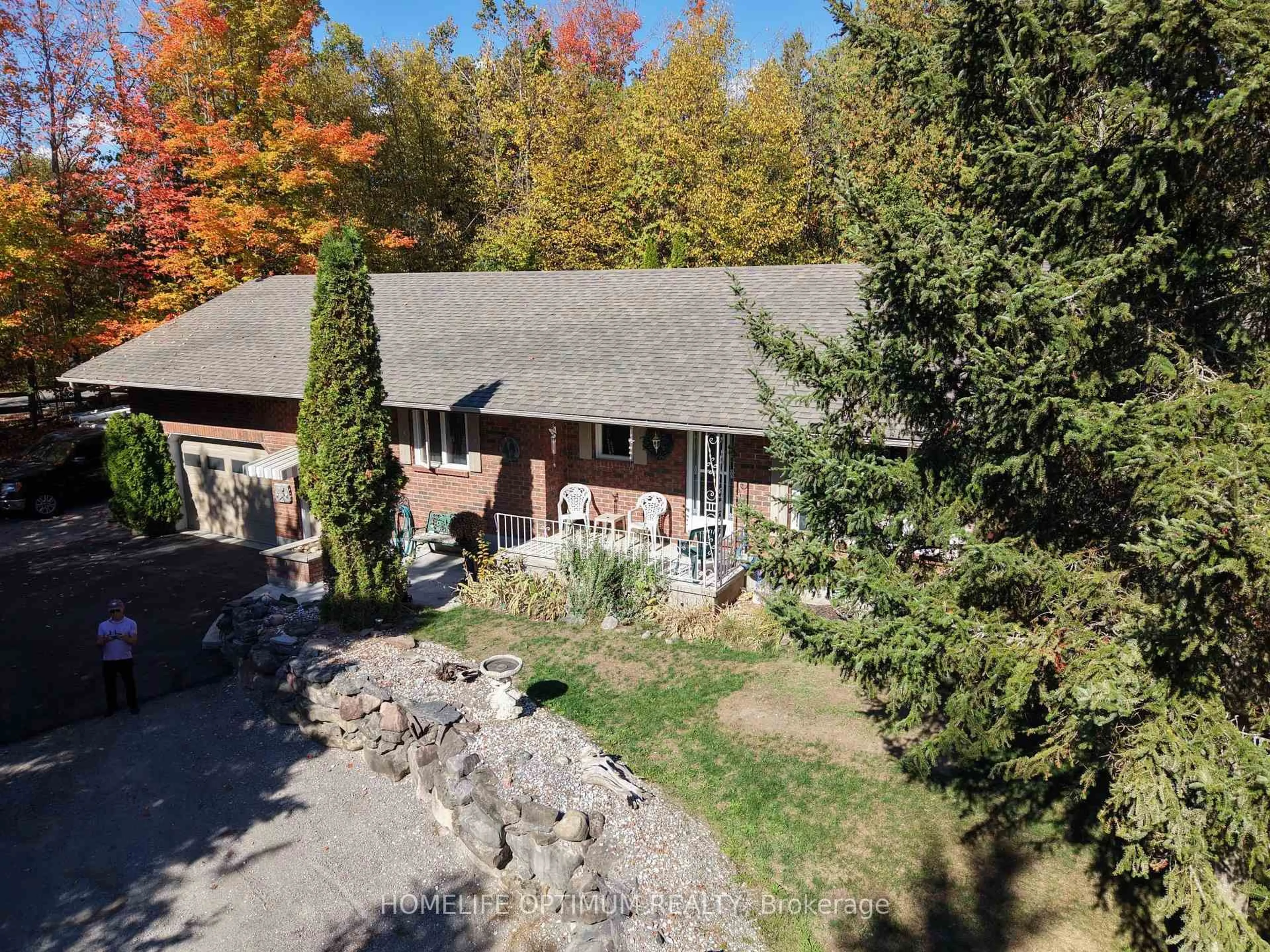 A pic from outside/outdoor area/front of a property/back of a property/a pic from drone, unknown for 228 Pirates Glen Dr, Trent Lakes Ontario K0M 1A0