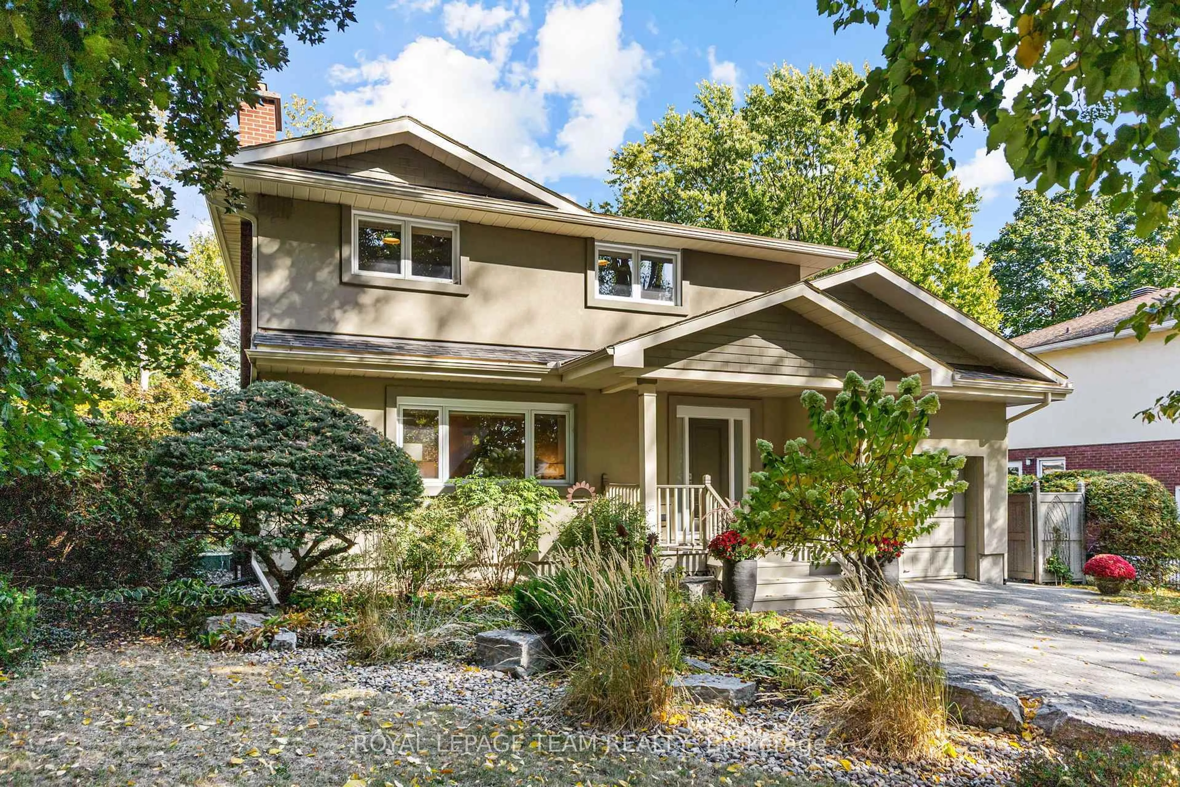 Home with vinyl exterior material, street for 937 Kingsmere Ave, Ottawa Ontario K2A 3K2