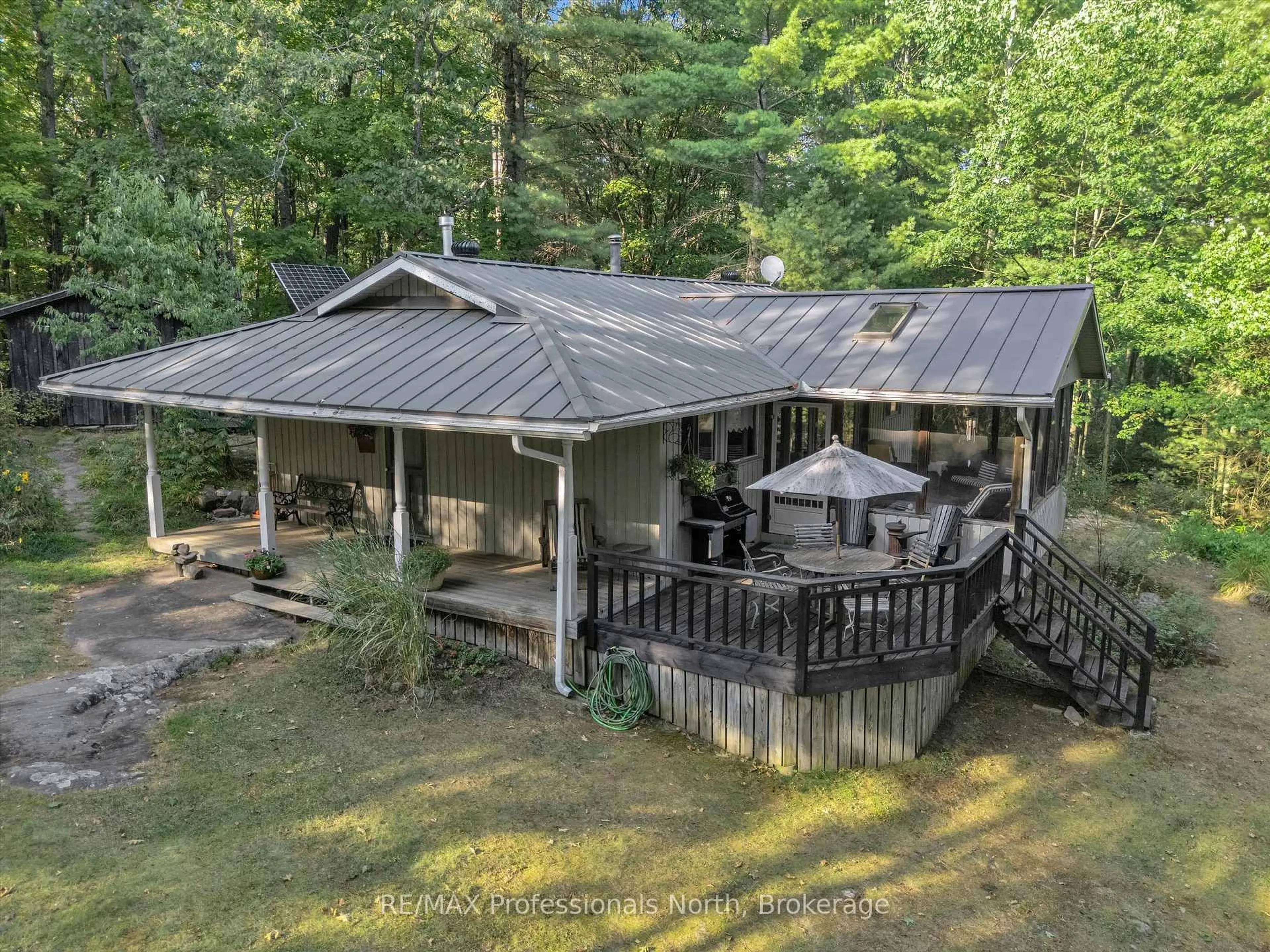 A pic from outside/outdoor area/front of a property/back of a property/a pic from drone, unknown for 1401 Rocksborough Road Pvt 2, Bracebridge Ontario P1L 1X3