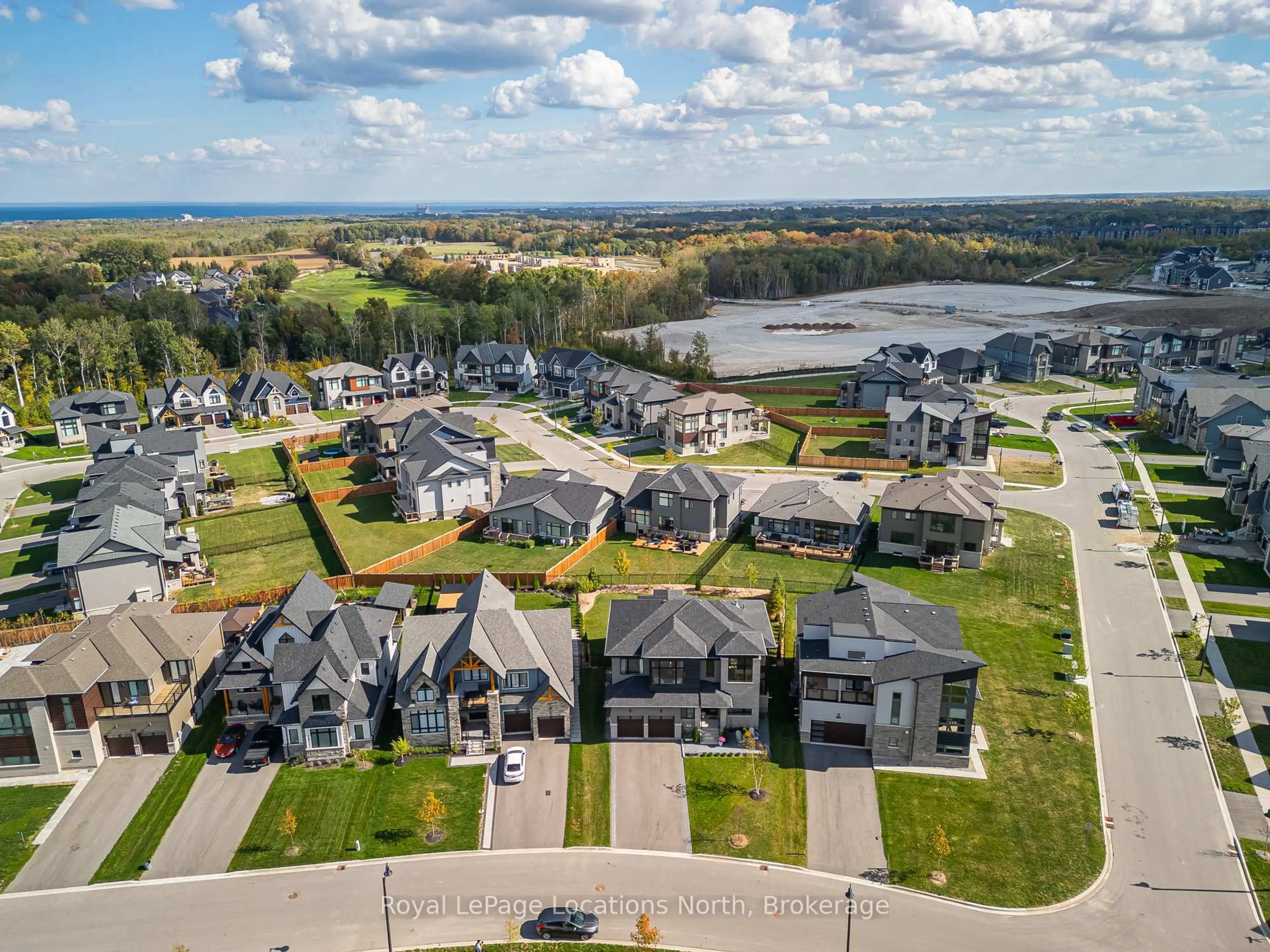 A pic from outside/outdoor area/front of a property/back of a property/a pic from drone, water/lake/river/ocean view for 143 Springside Cres, Blue Mountains Ontario L9Y 5J6