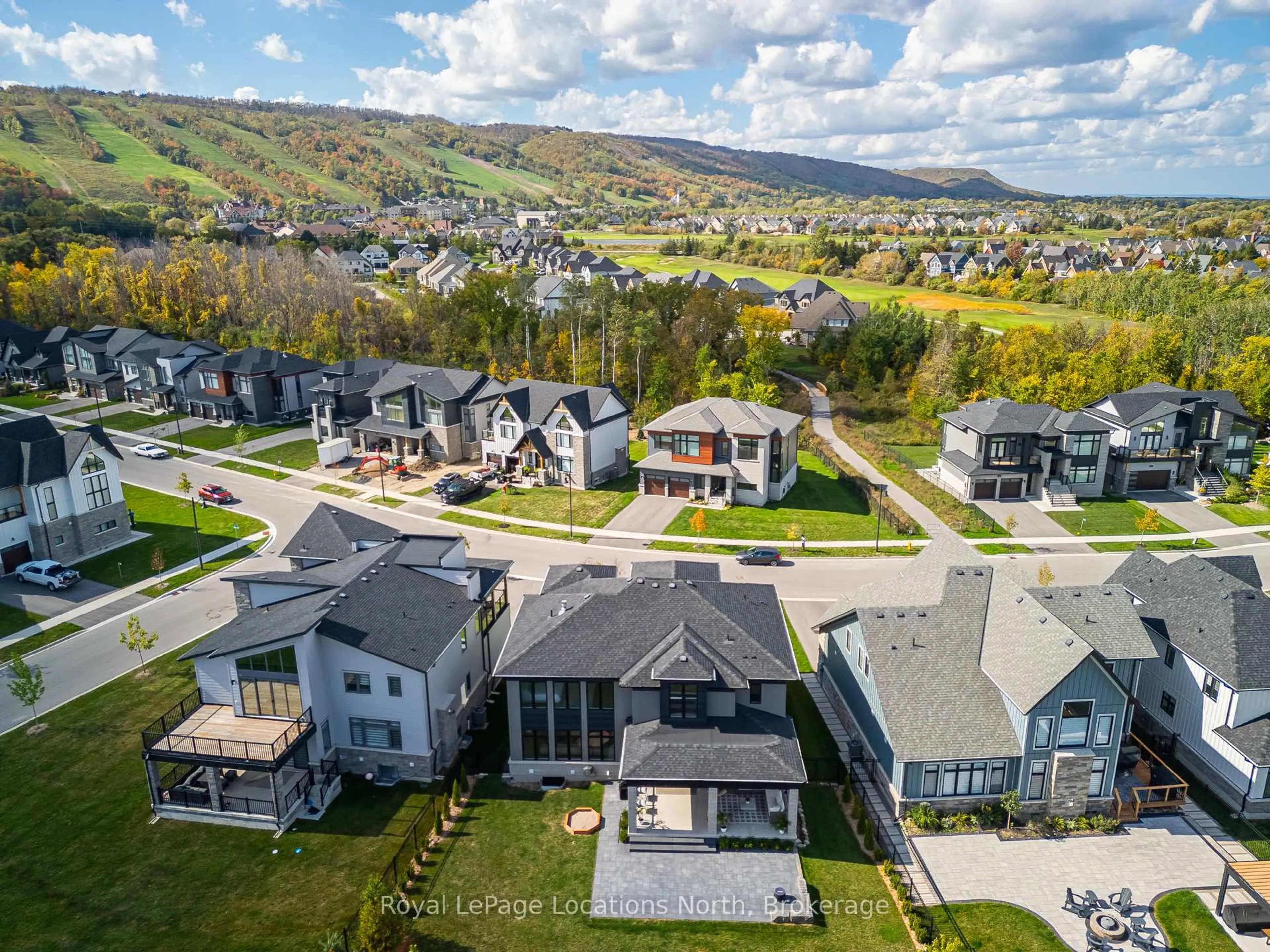 A pic from outside/outdoor area/front of a property/back of a property/a pic from drone, mountain view for 143 Springside Cres, Blue Mountains Ontario L9Y 5J6