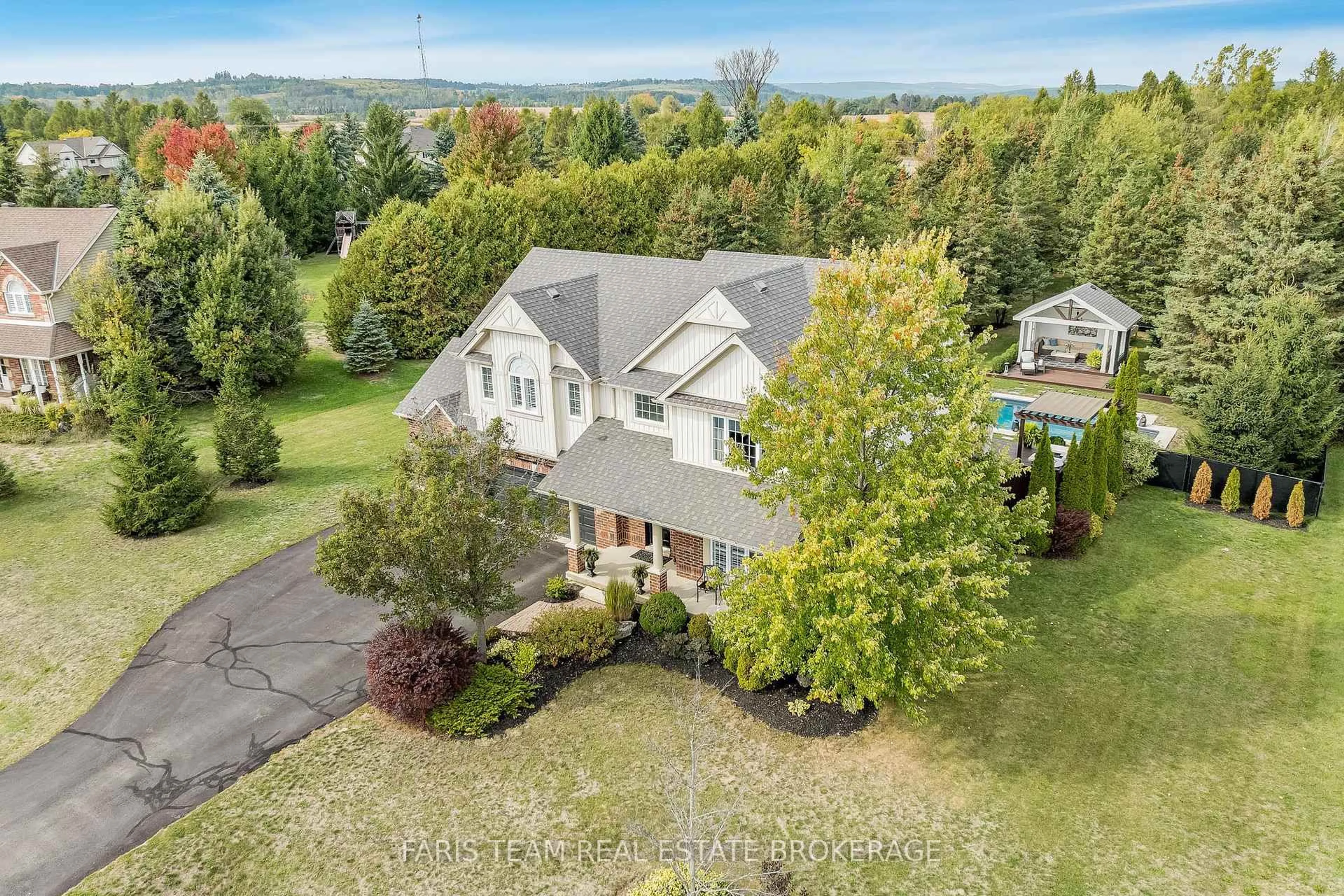 A pic from outside/outdoor area/front of a property/back of a property/a pic from drone, water/lake/river/ocean view for 6 Somerville Cres, Mulmur Ontario L0N 1M0