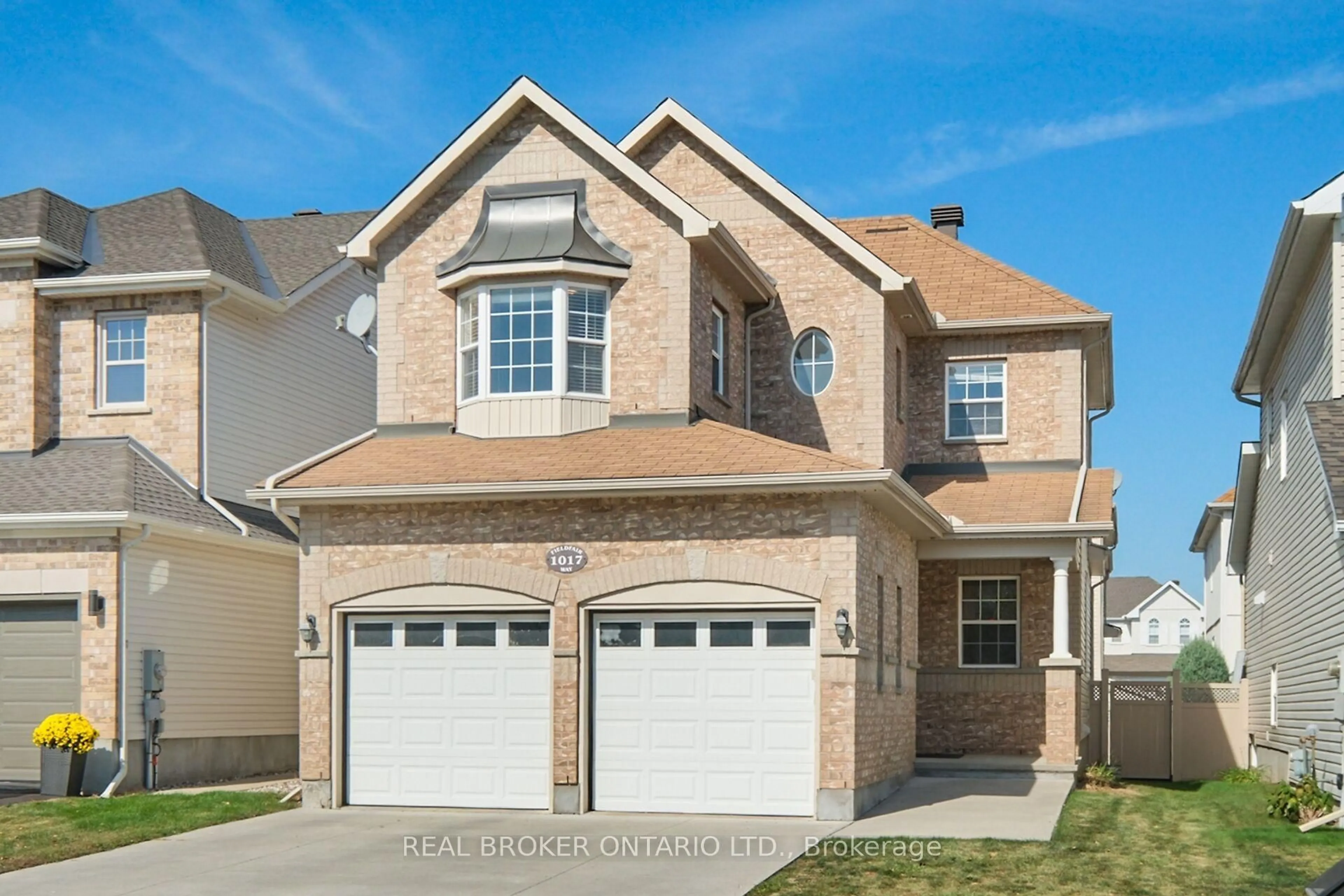 Home with brick exterior material, street for 1017 Fieldfair Way, Ottawa Ontario K4A 0E4