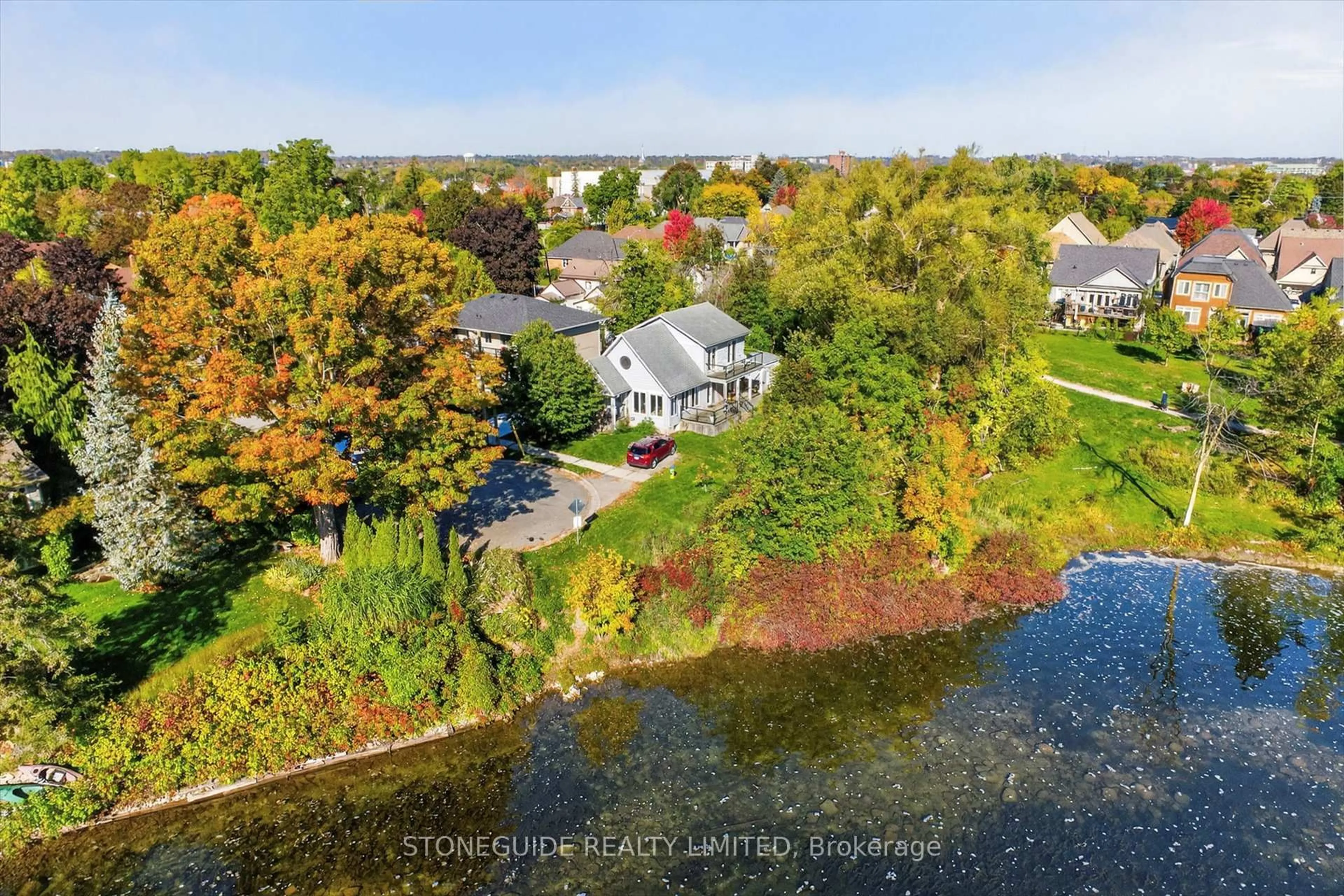 A pic from outside/outdoor area/front of a property/back of a property/a pic from drone, water/lake/river/ocean view for 122 Fradette Ave, Peterborough Ontario K9J 1T5