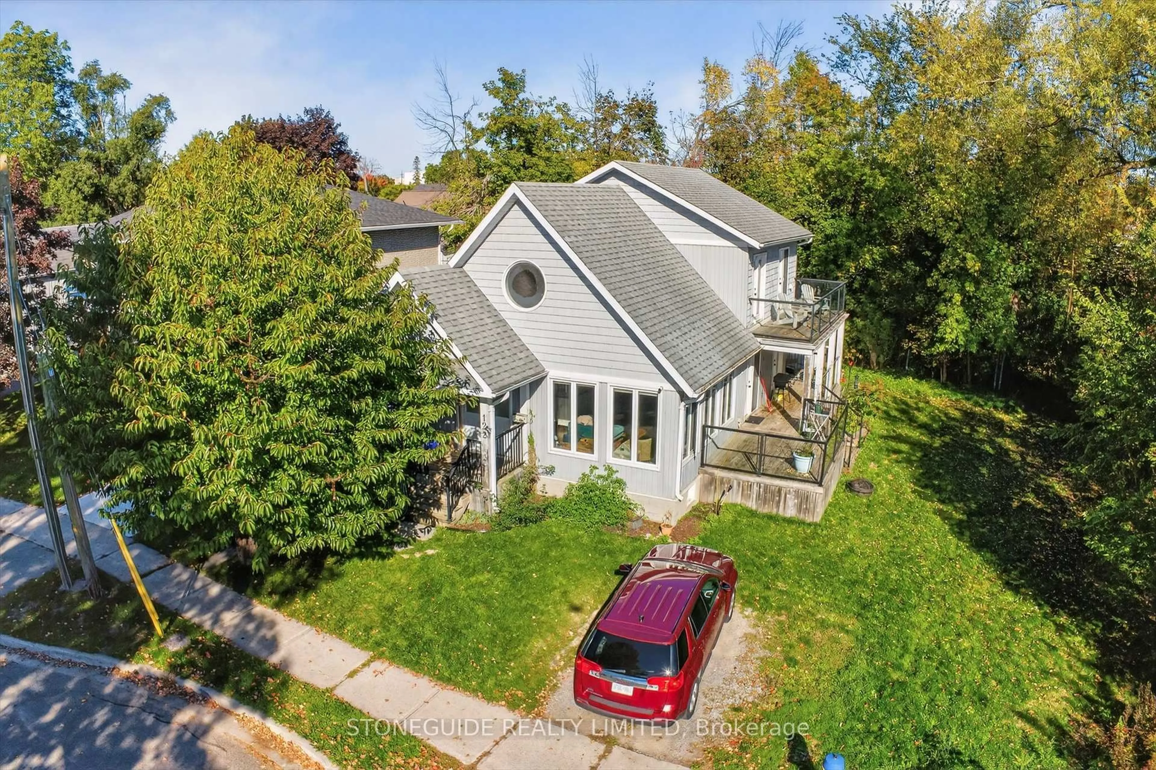 A pic from outside/outdoor area/front of a property/back of a property/a pic from drone, street for 122 Fradette Ave, Peterborough Ontario K9J 1T5