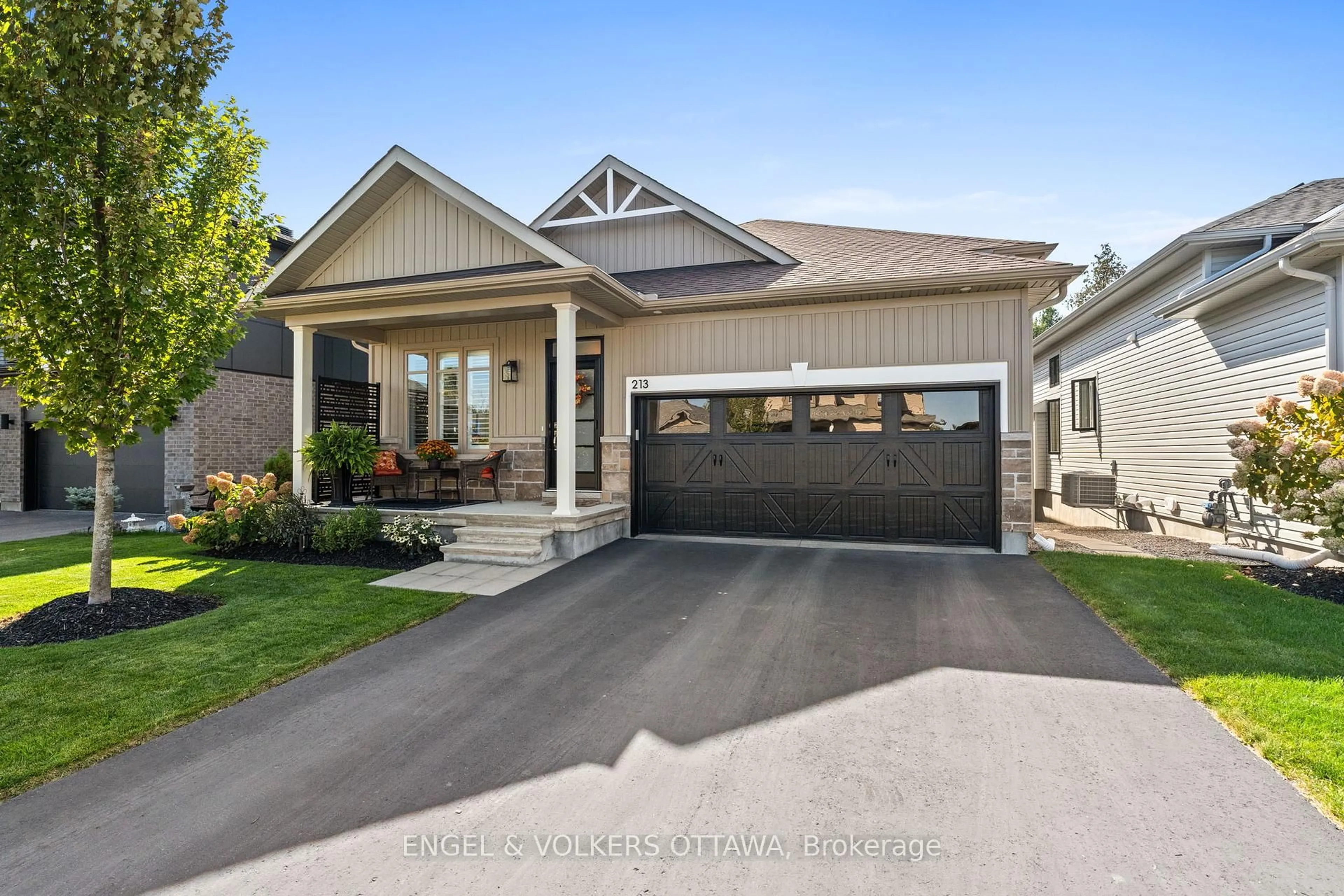 Home with vinyl exterior material, street for 213 Blackhorse Dr, North Grenville Ontario K0G 1J0