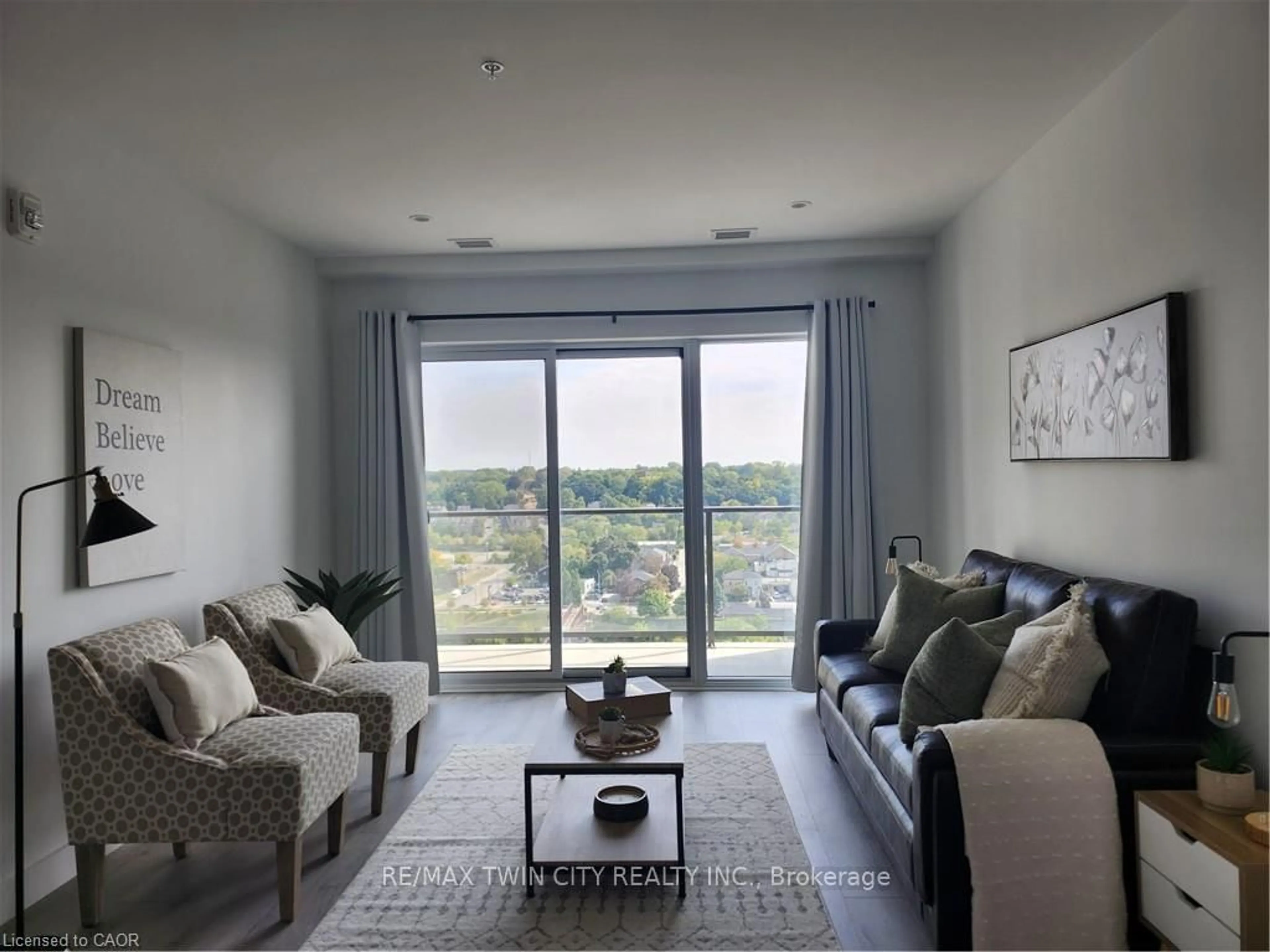 Living room with furniture, unknown for 15 Glebe St #1211, Cambridge Ontario N1S 0C3