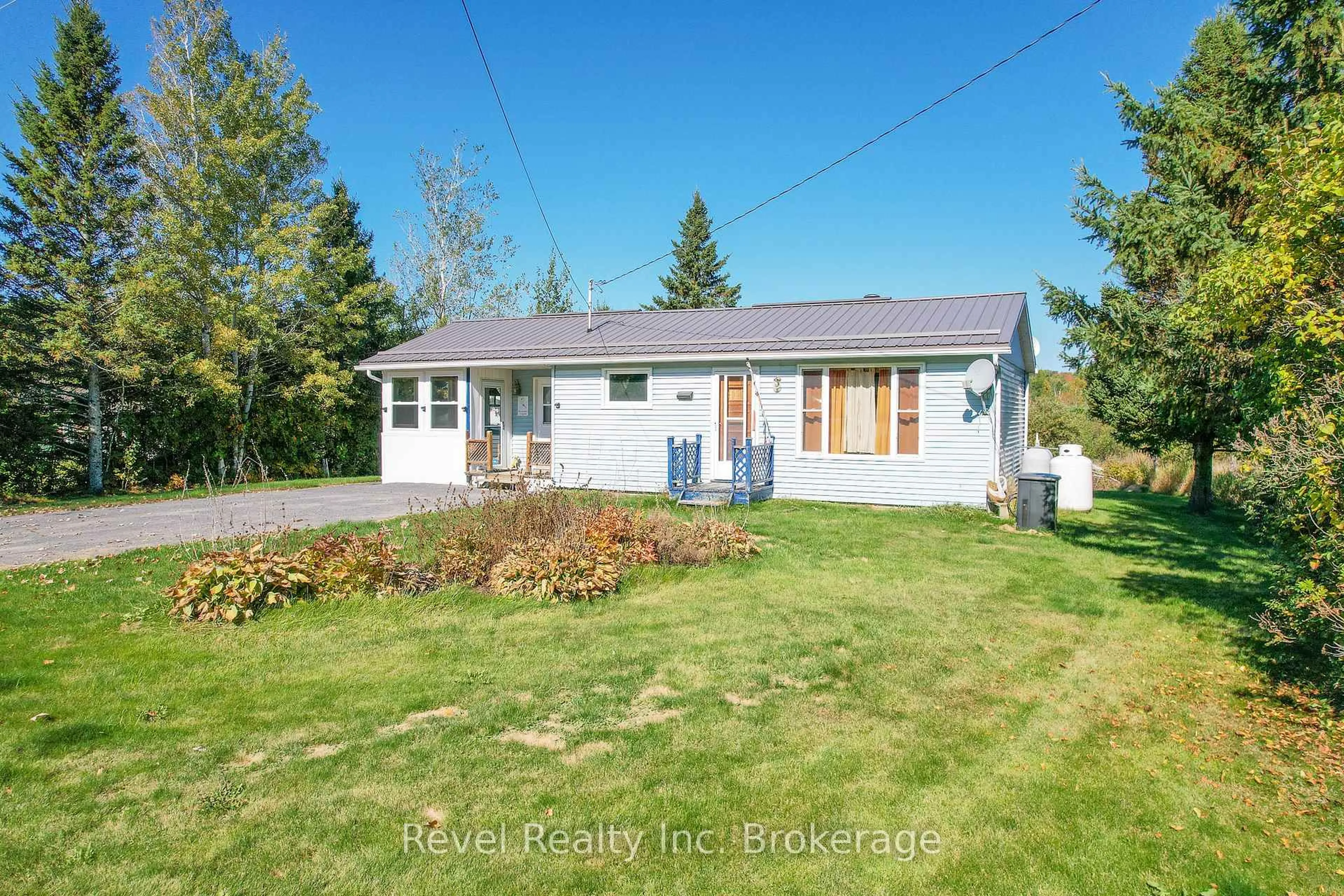 A pic from outside/outdoor area/front of a property/back of a property/a pic from drone, street for 2816 Chiswick Line, Chisholm Ontario P0H 1Z0