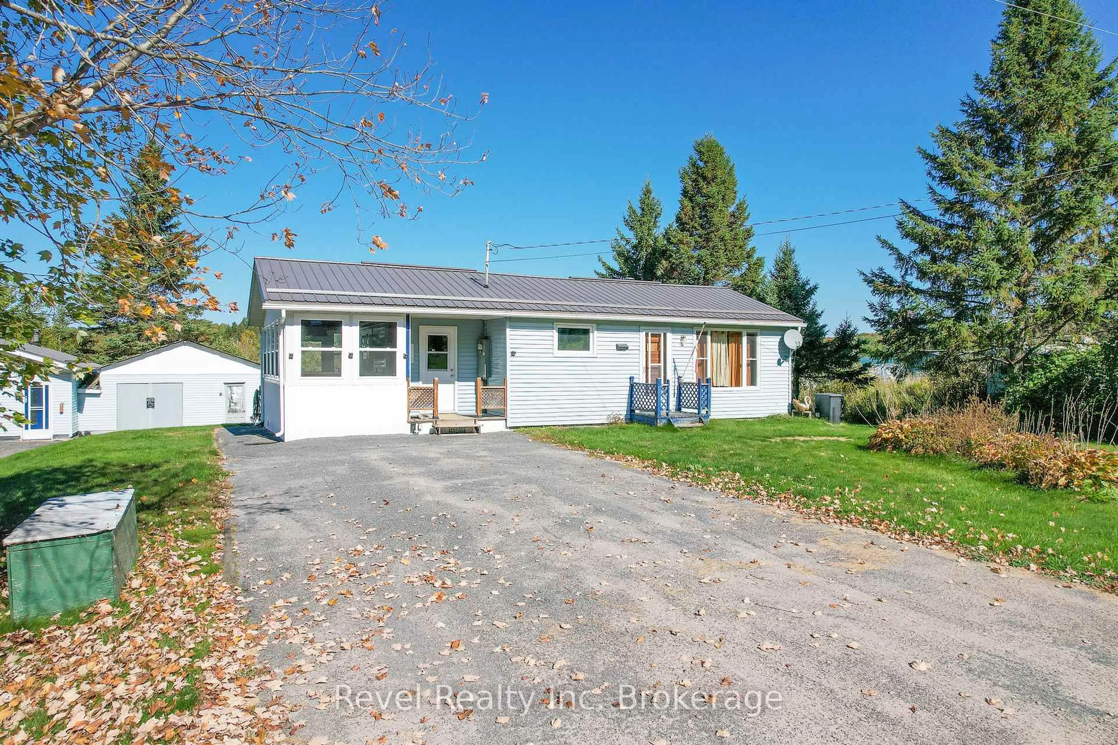 Home with vinyl exterior material, street for 2816 Chiswick Line, Chisholm Ontario P0H 1Z0